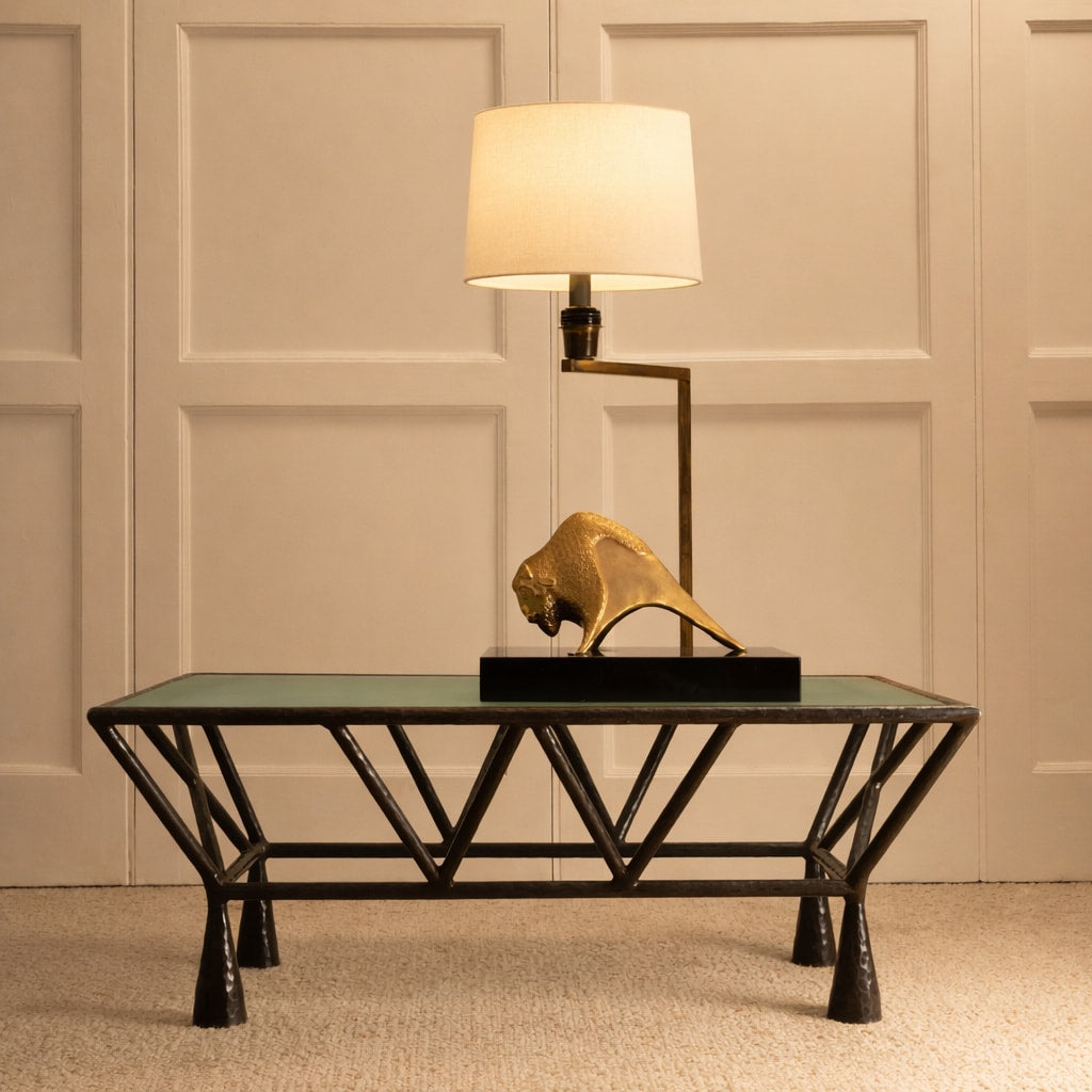 Zebra Coffee Table — front view with glass top and brass lamp