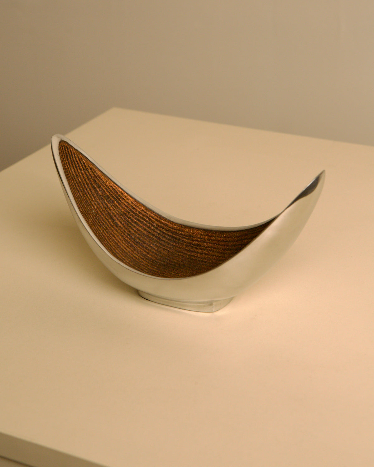 Italian brown and grey aluminium crescent catch-all by Simmi Italia, 1970s — lifestyle setting
