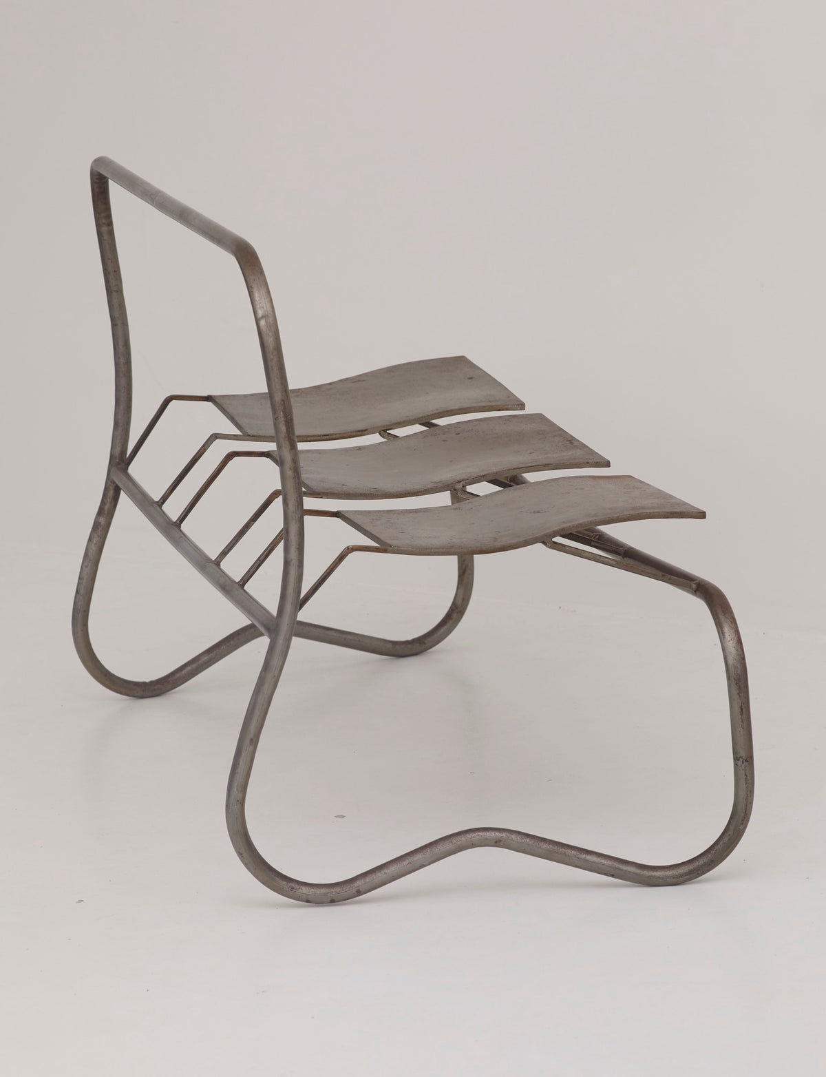 Unique Signed Artist Bench / Settee in Metal — side angle showing metal frame design