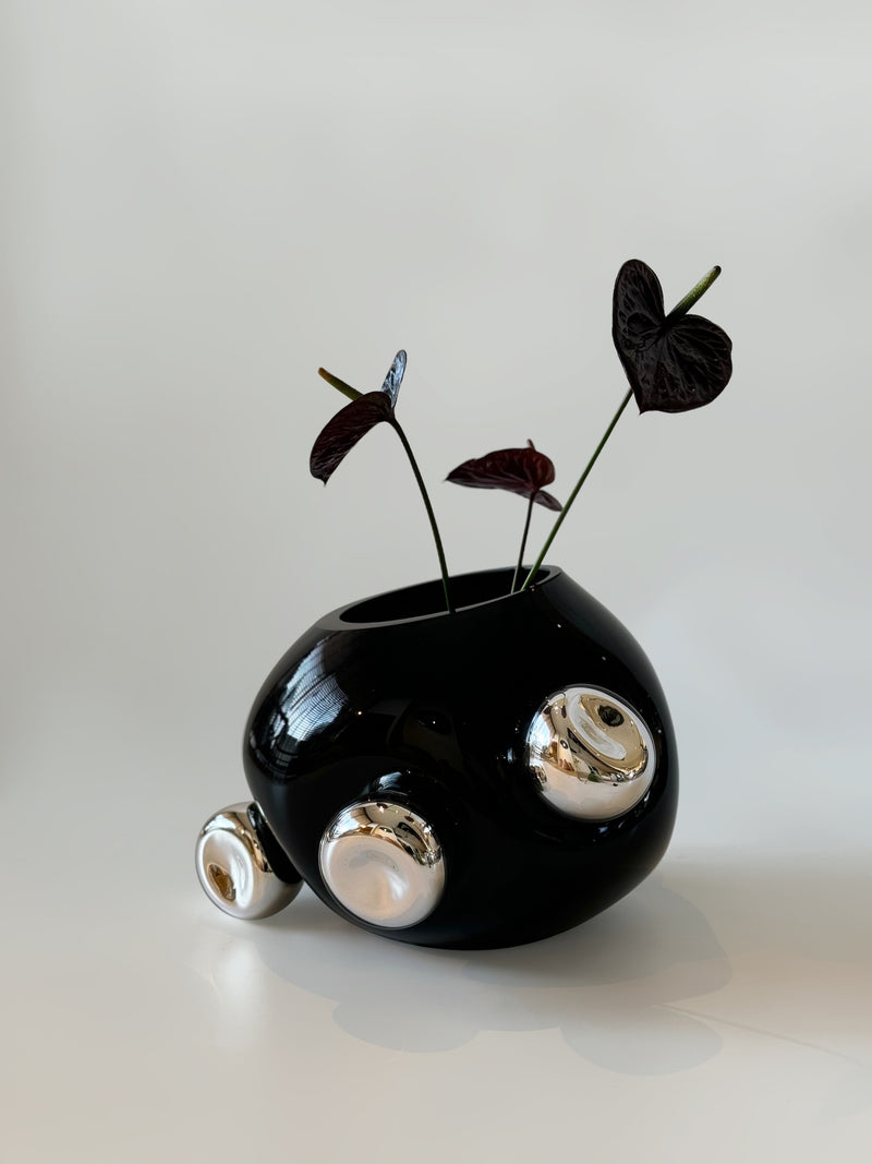 Bud Vase by HOMA | The Oblist — black ceramic with silver accents