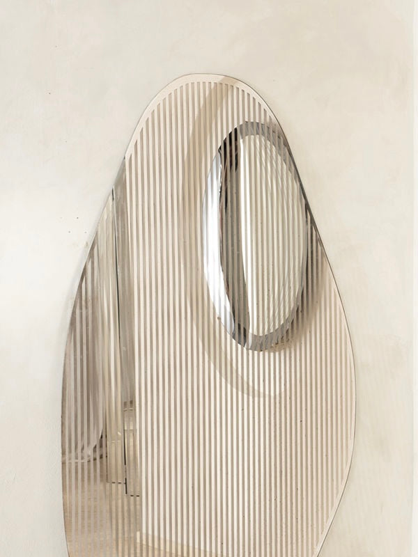 Line I Mirror — close-up of reflective surface with vertical lines
