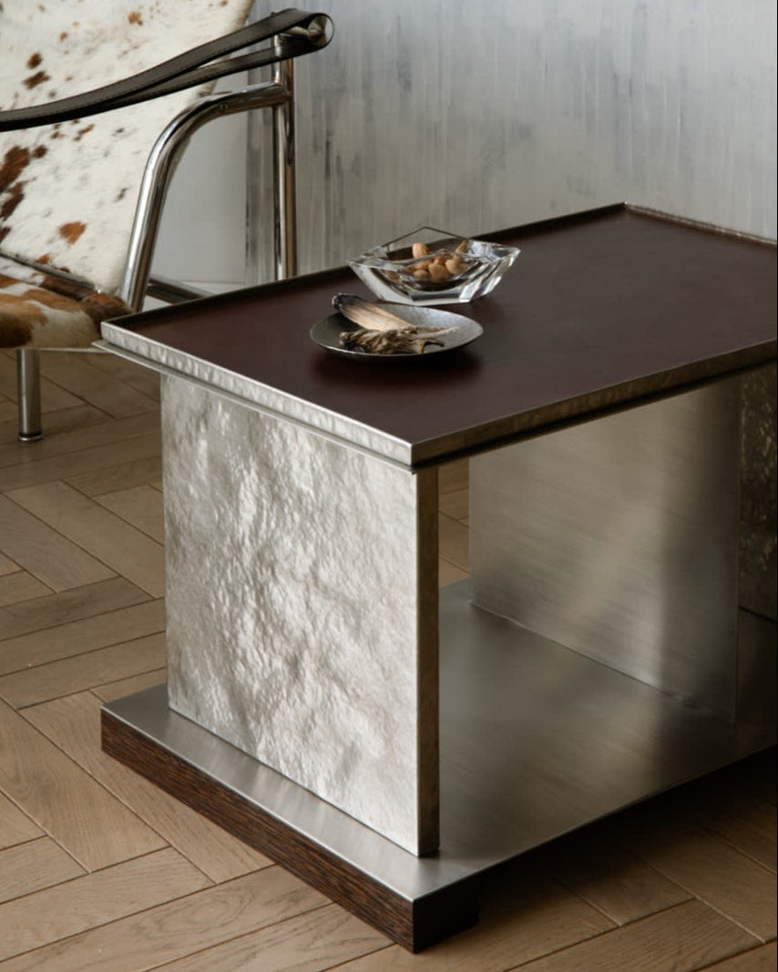 YUMA side table showcasing white textured stone and dark wood details