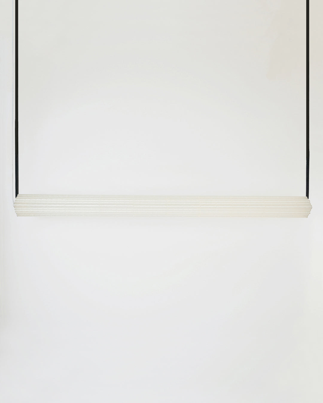 Goth pendant light detail view showing minimalist black frame design