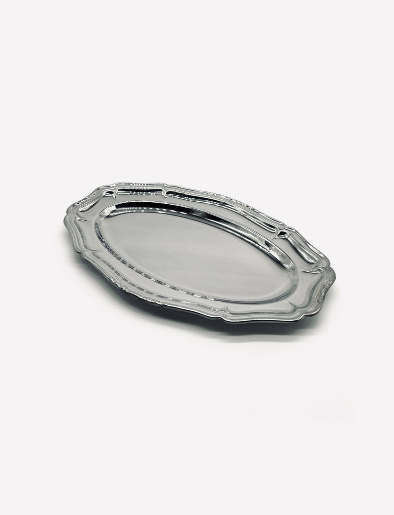 The LA PARADE Medium serving dish is a shiny, oval-shaped vintage stainless steel piece with an ornate decorative edge, shown on a plain white background.