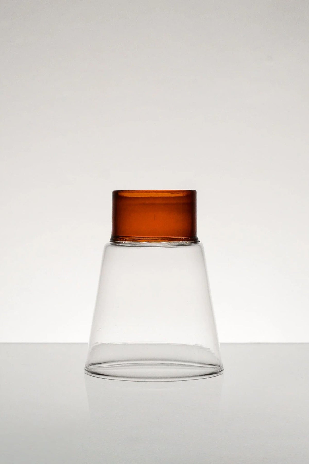 Podio' Glass - Amber — close-up of glass with amber top
