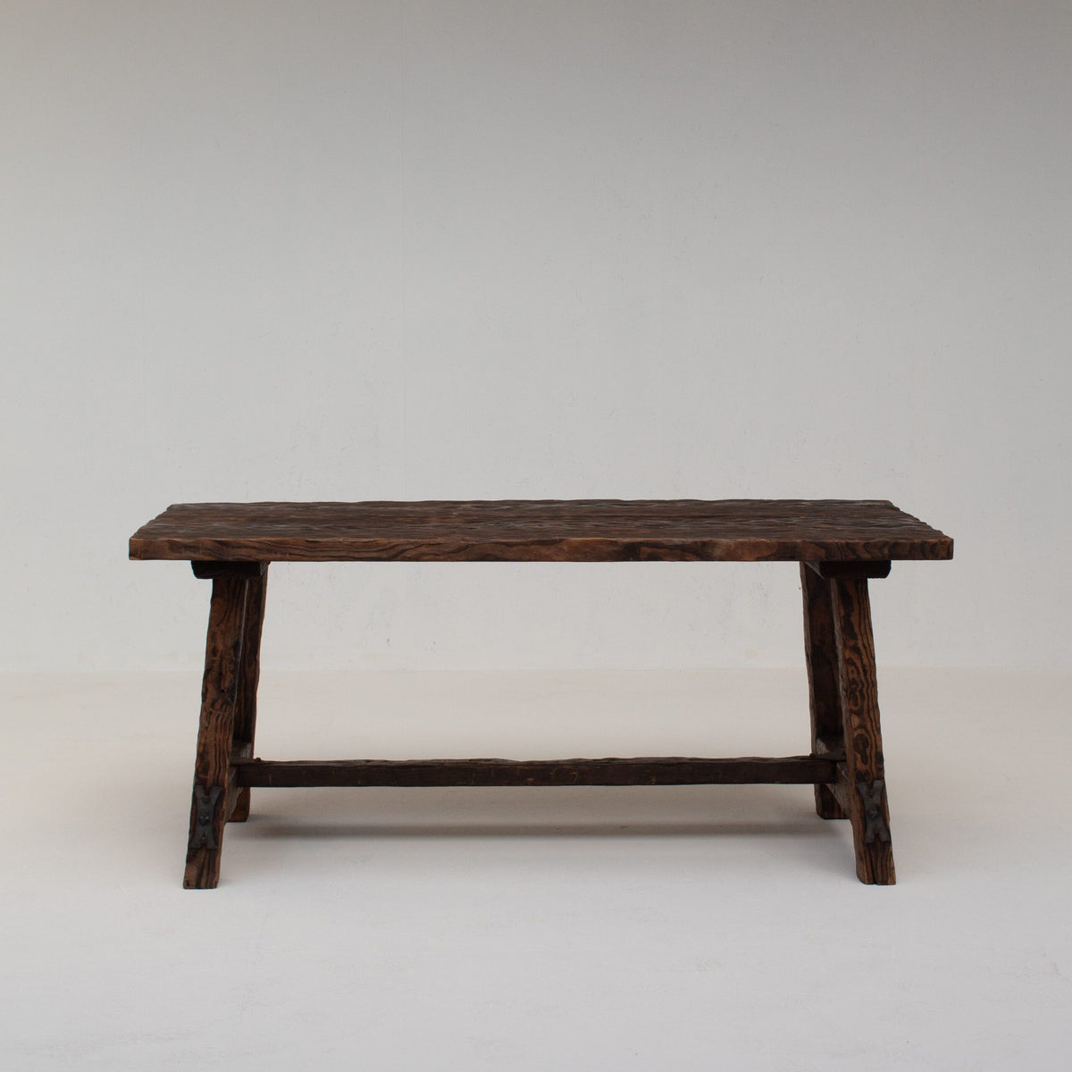 Brutalist Solid Wood Coffee Table — back view highlighting dark wood grain