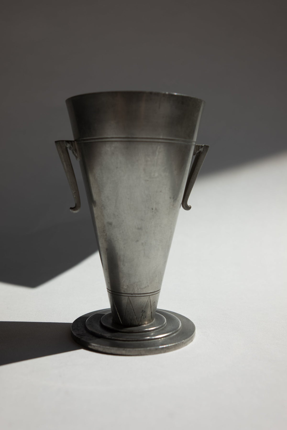 Swedish Grace Pewter Trumpet Vase by Prima Svenskt Tenn, 1930 — lifestyle setting