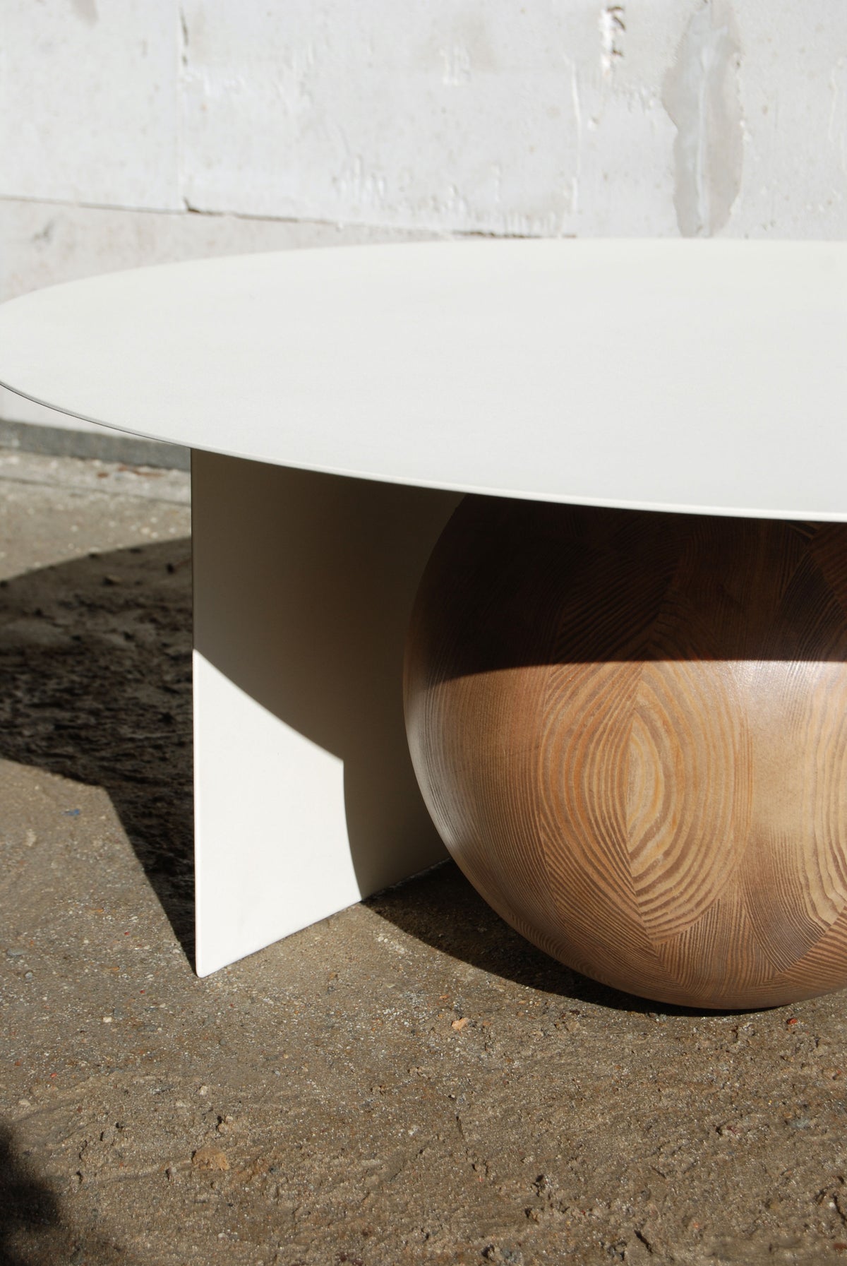 FUKU Coffee Table — back view highlighting wooden sphere base