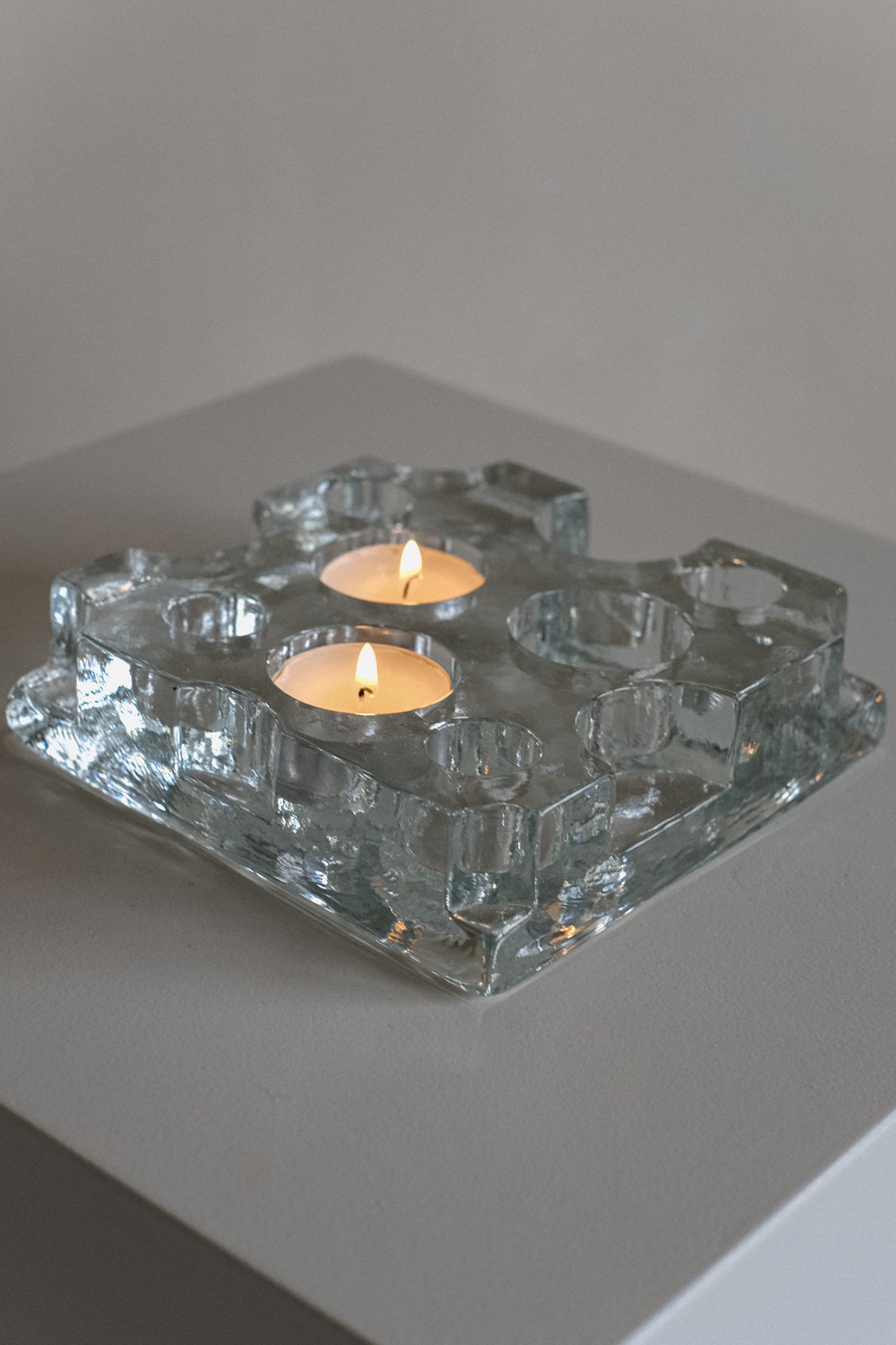 Glass Candle Holder — top view of clear glass with two candles