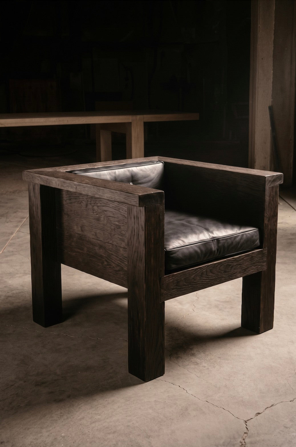 Tephra Lounge Chair in Leather and Oak — lifestyle setting