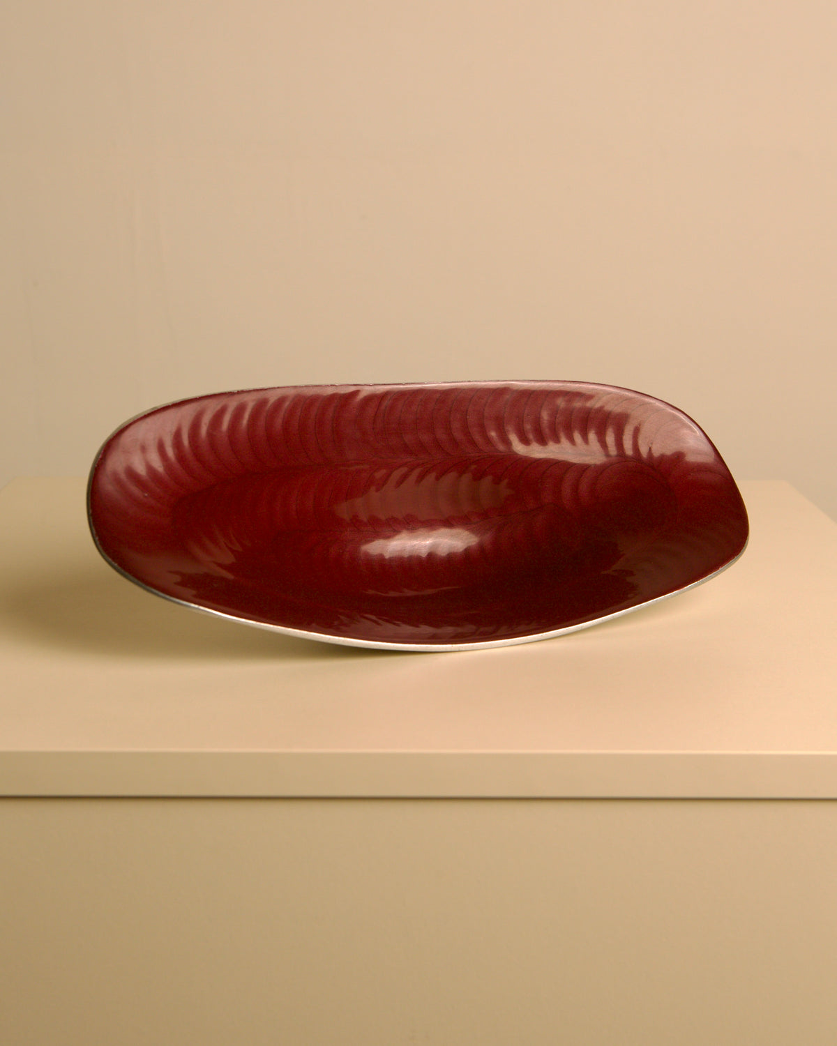 Italian burgundy aluminium "Galassia" catch-all by Brandani, 1980s — side angle