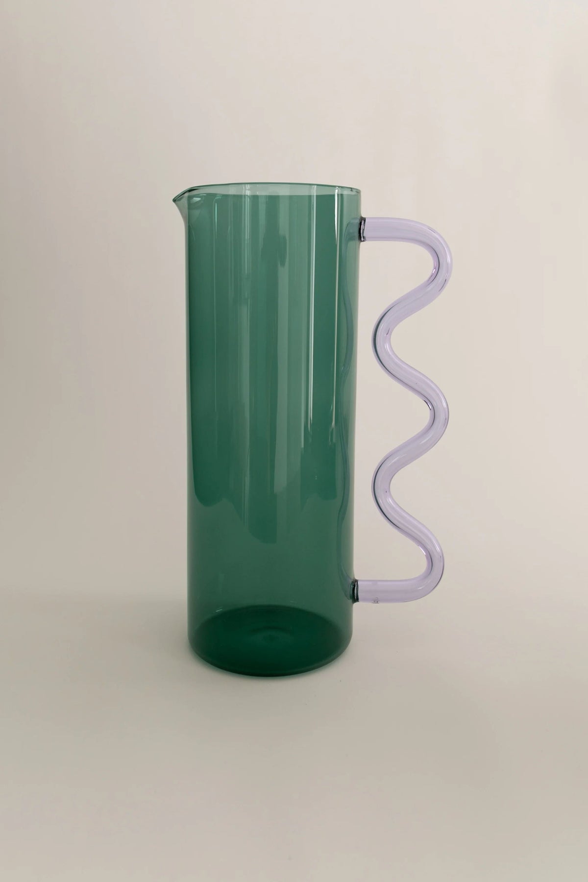 Wave Pitcher — side view highlighting green plastic and purple handle
