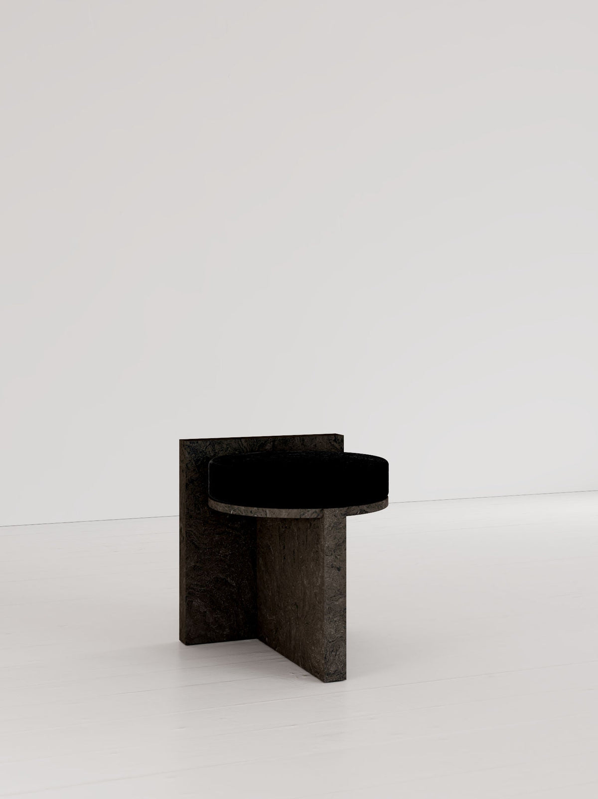 Meï 01' Stool — side view showing black stone material