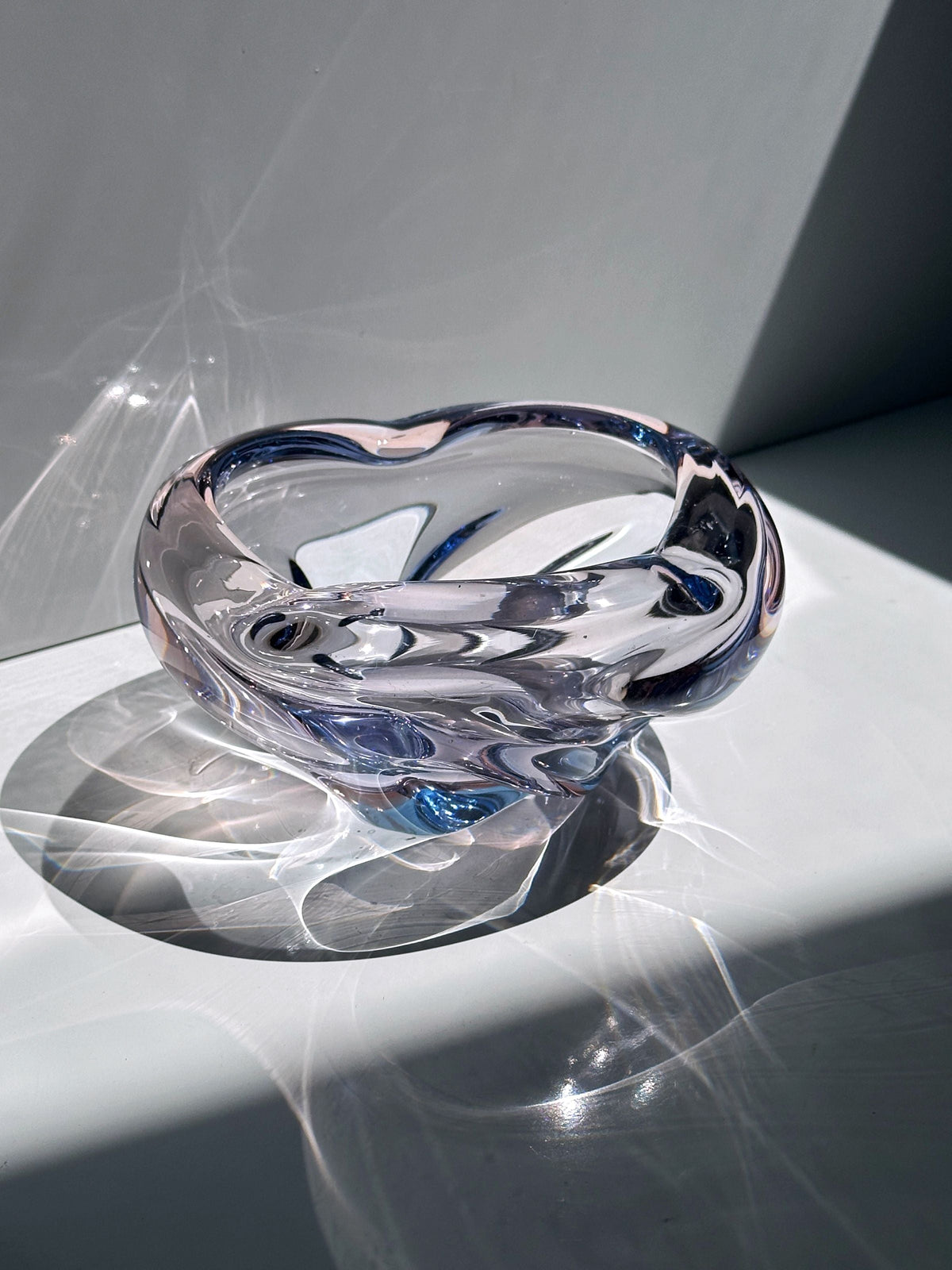 Clear glass vide-poches with blue swirled accents by Jaroslav Beranek
