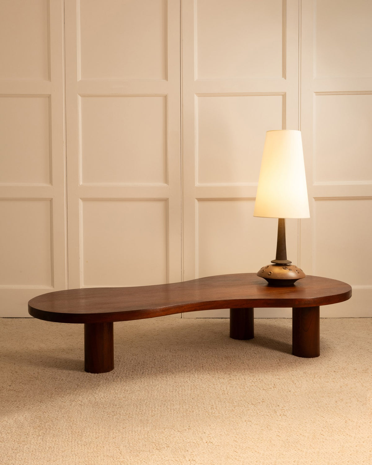 Danish 70s table lamp with ceramic base on oval walnut coffee table
