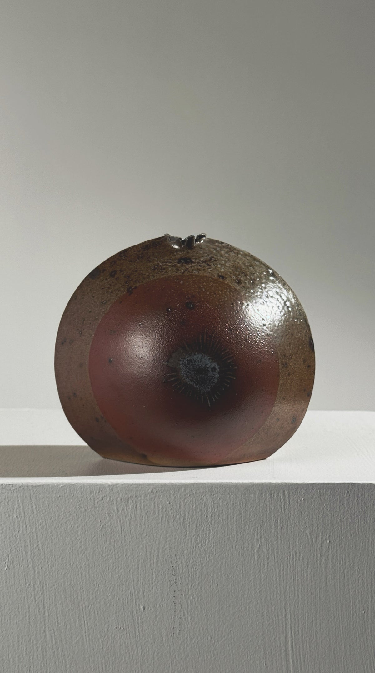 Brown stoneware vase with eye motif by Gustave Tiffoche 1965