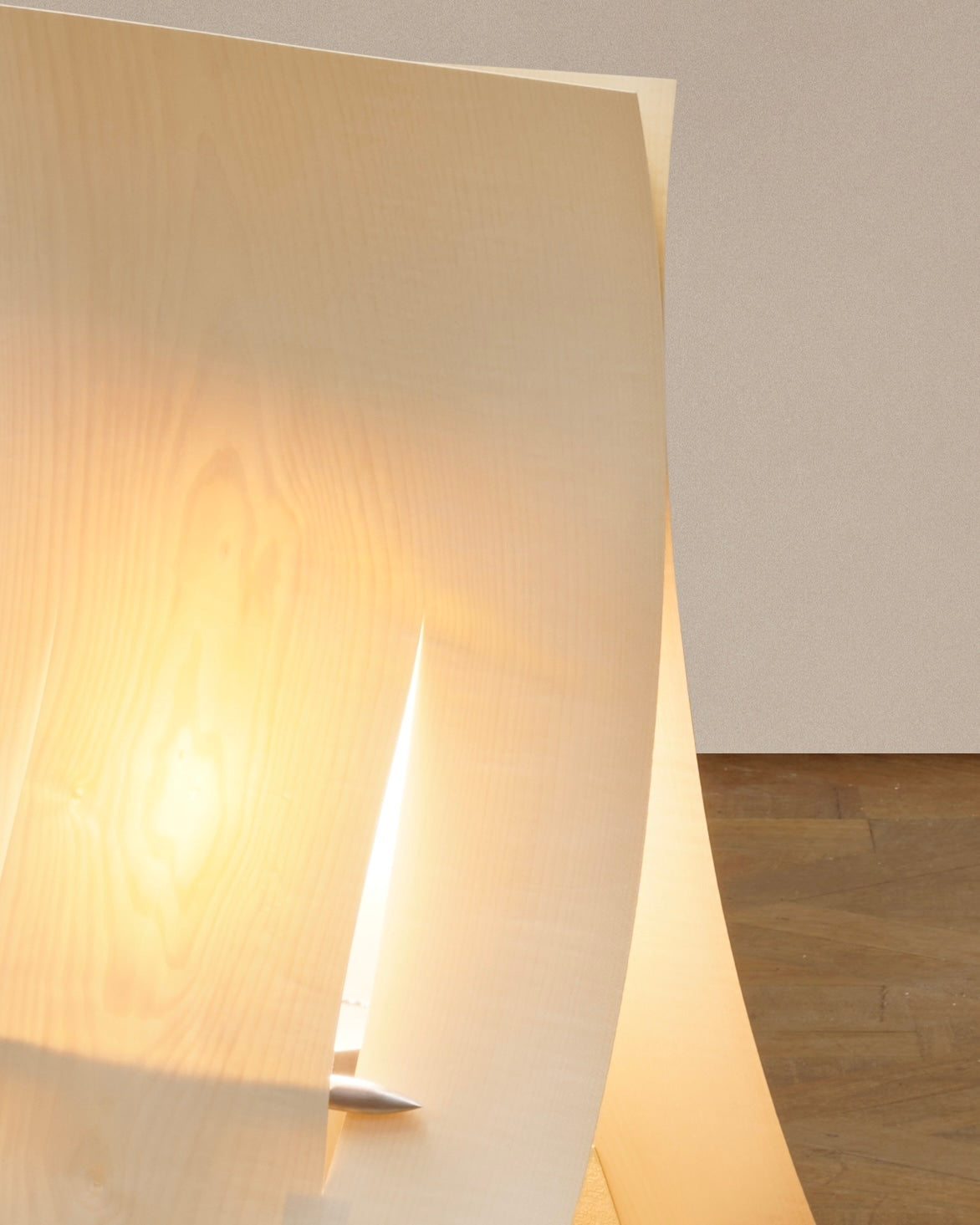 Soft Ply table lamp curved shade detail with warm ambient lighting