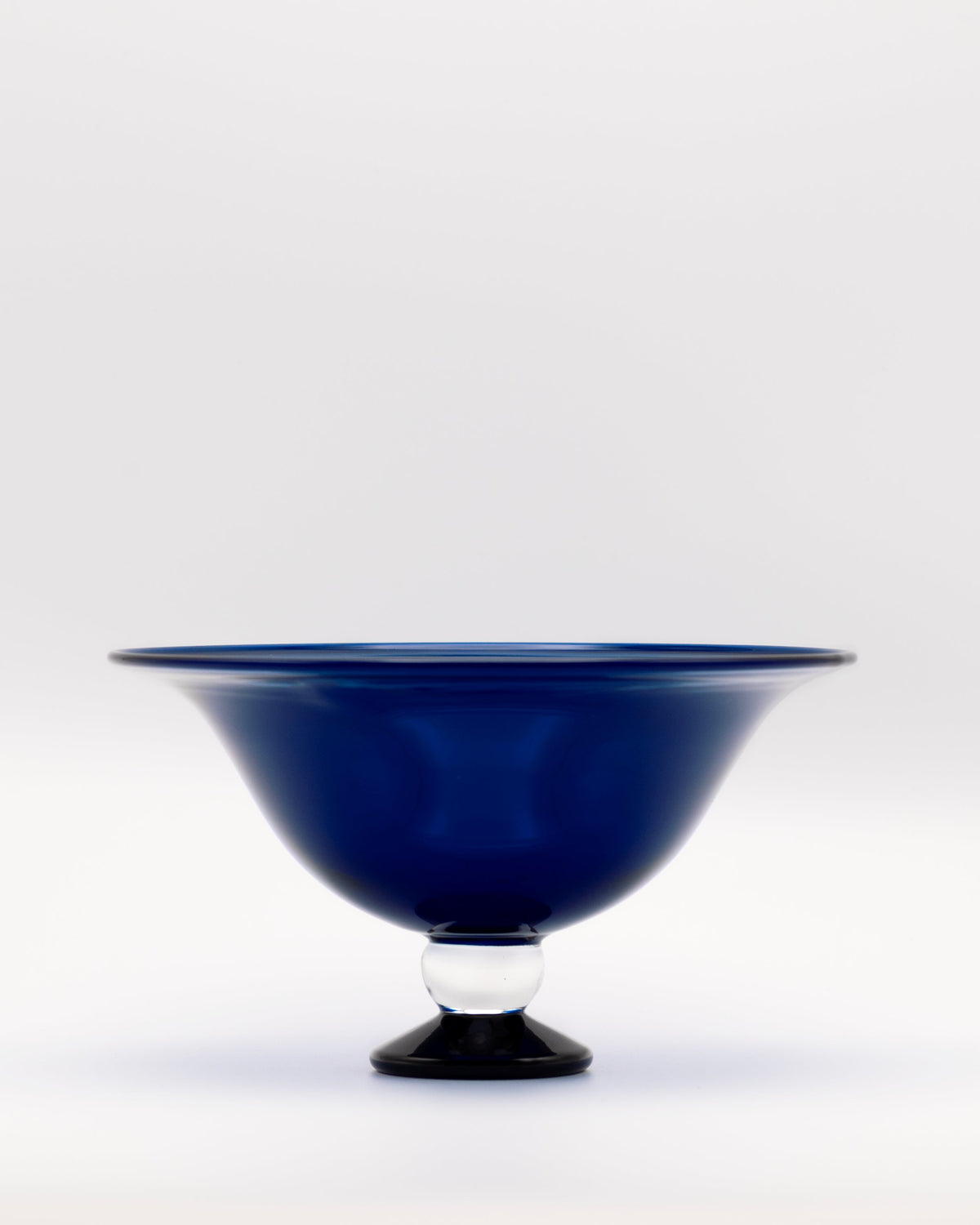 Fruit Bowl — close-up of deep blue glass with black base
