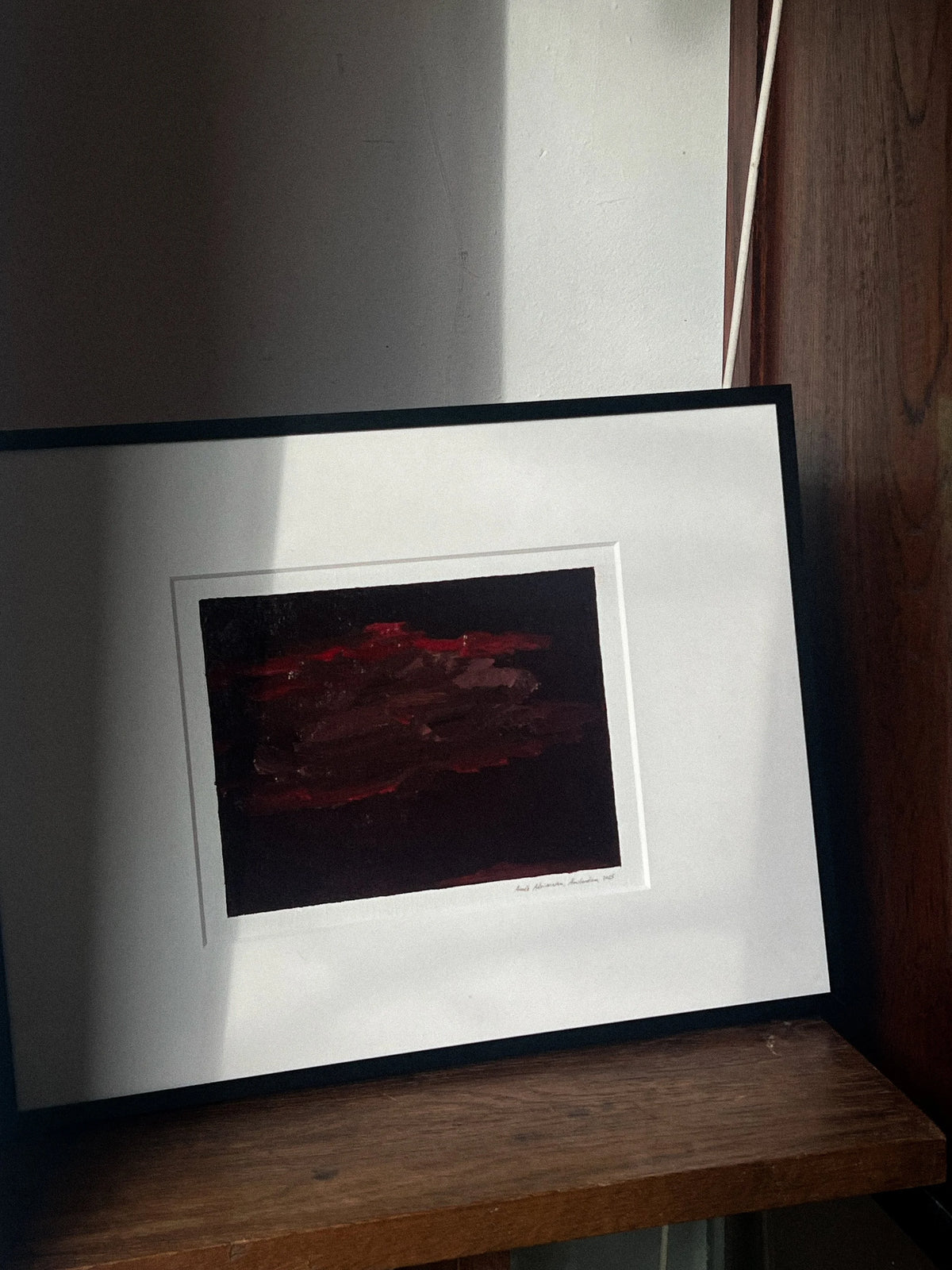 Oil painting on paper - 10 (2025) — side angle on wooden shelf