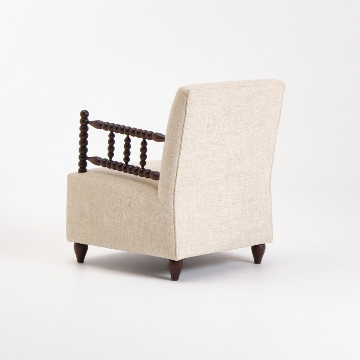 Bolha Lounge Chair — back view showing beige upholstery and wooden accents