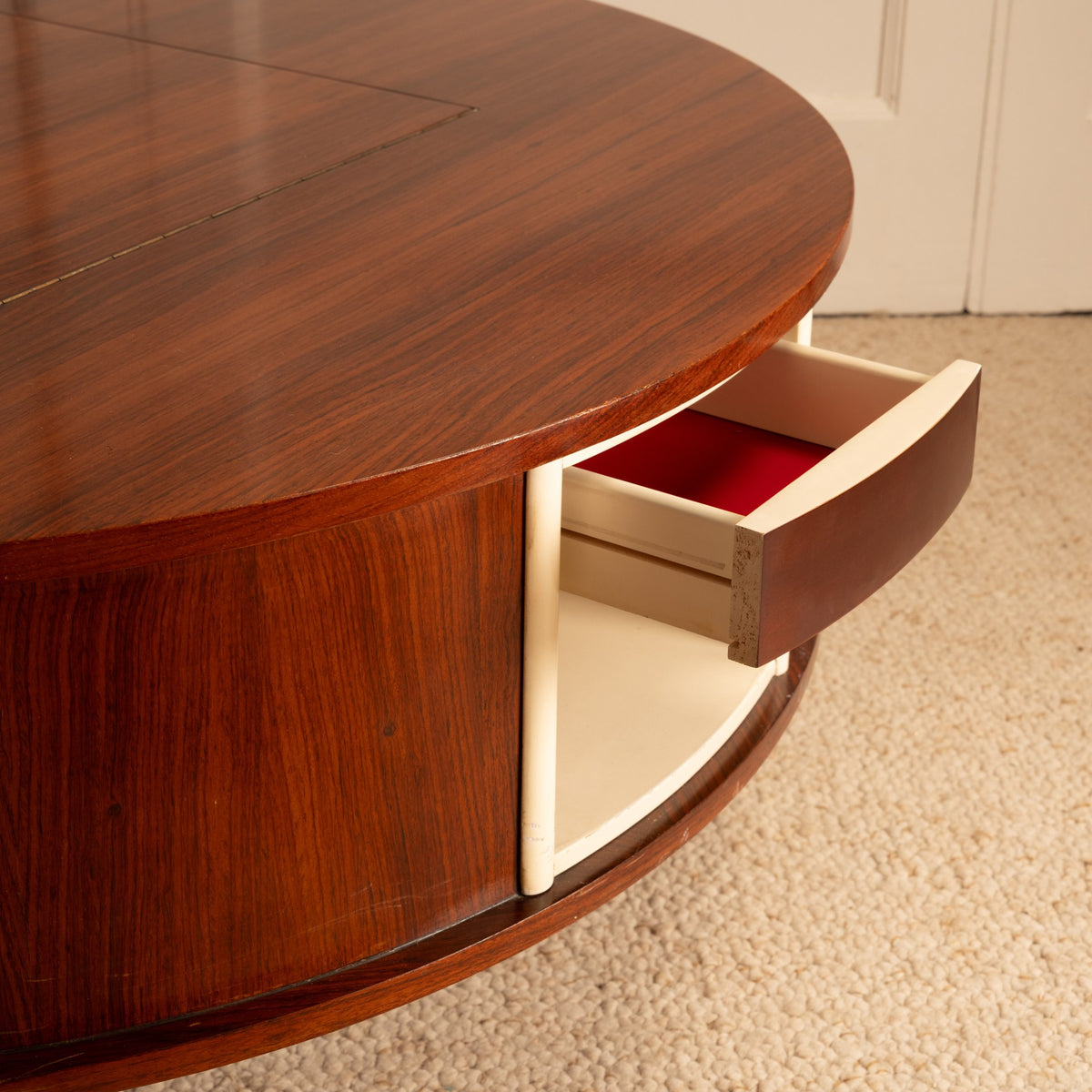Swivel Coffee Table — side angle showing open drawer and wood grain