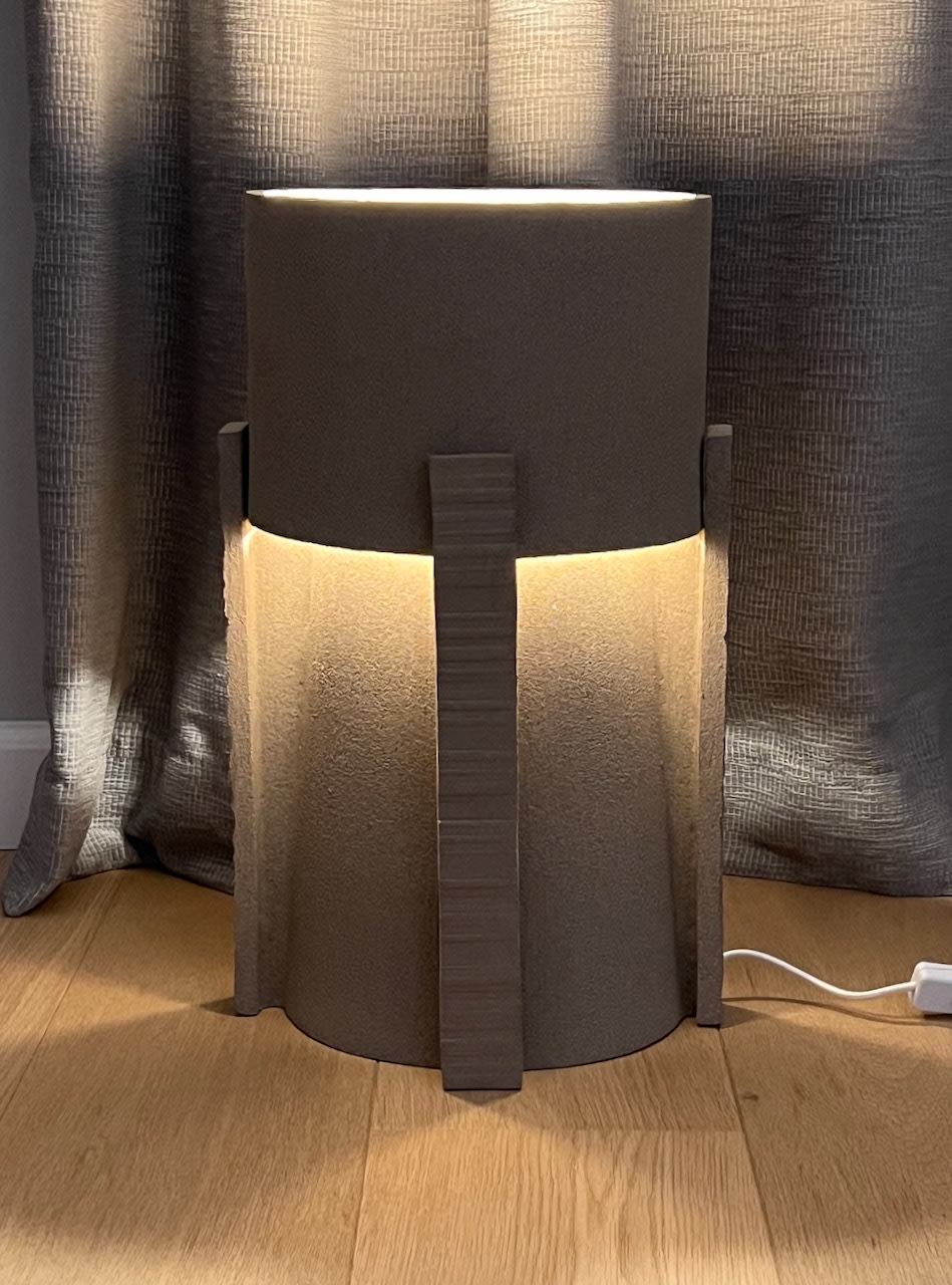 Hold ceramic table lamp with warm LED lighting and textured finish