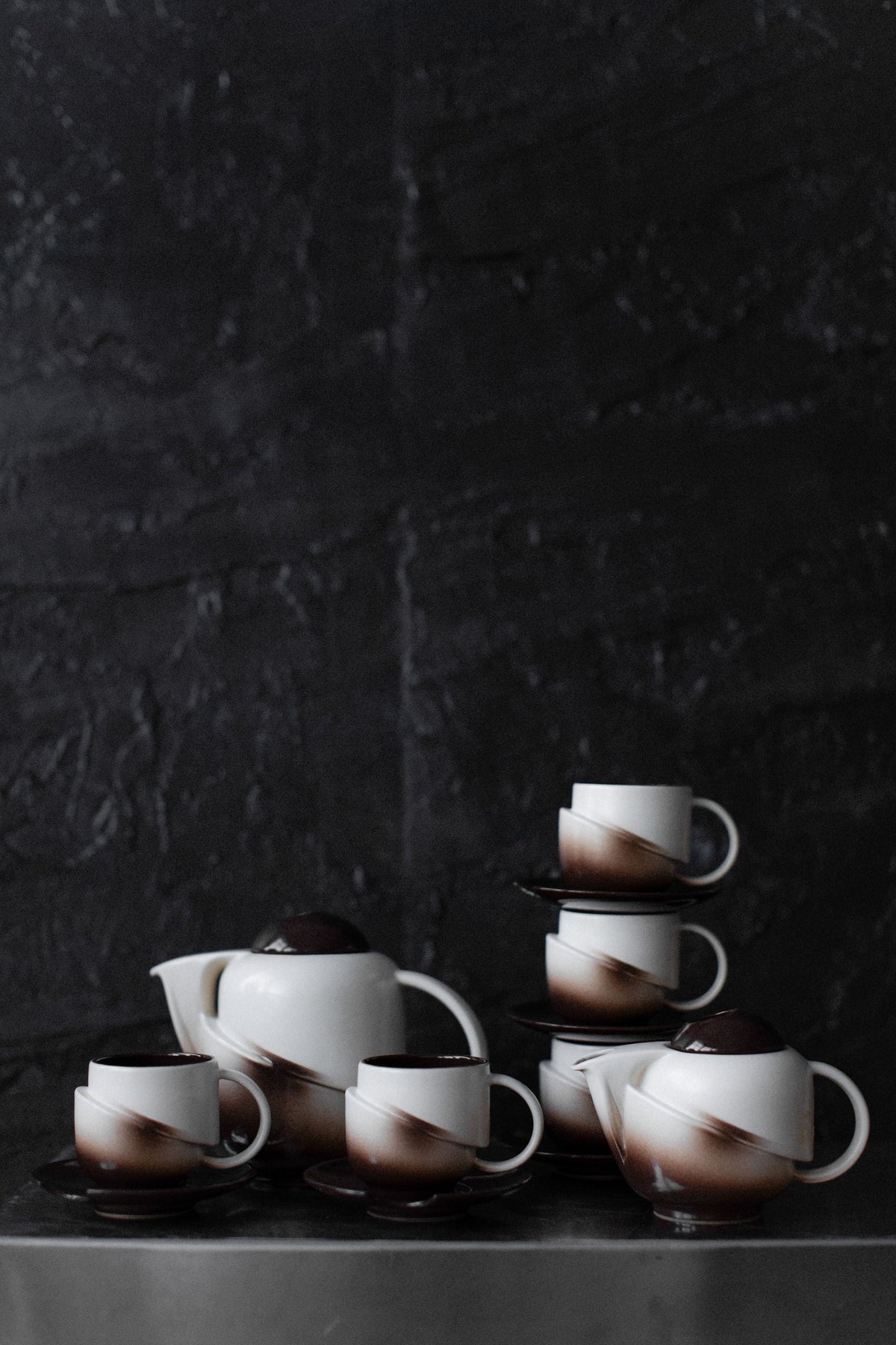 Art Deco ceramic coffee set with brown gradient cups and teapot