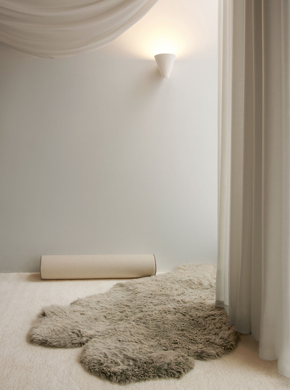 "Empyrean" Offwhite Wall Light — lifestyle setting