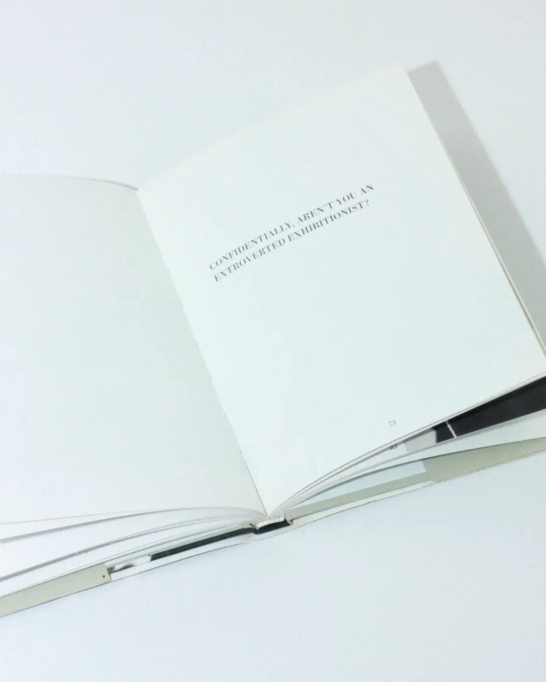 Dali's Mustache — open book showing blank pages and text