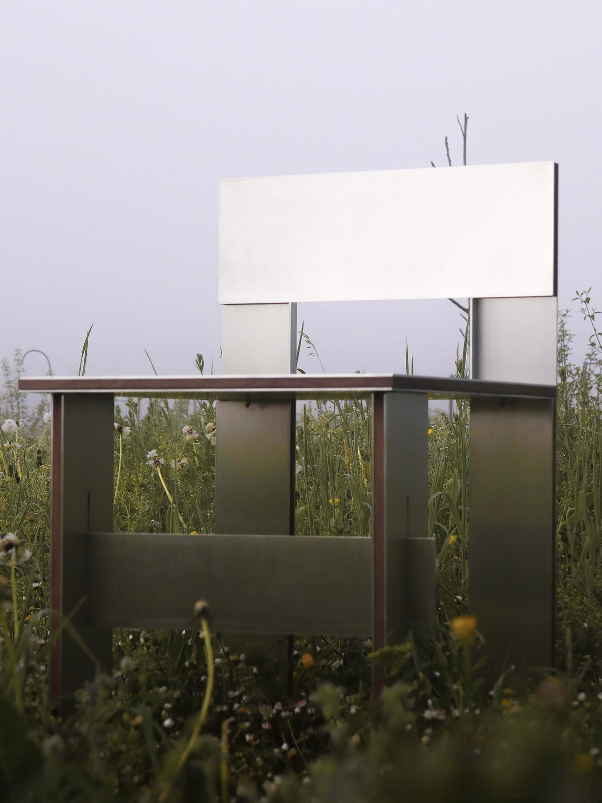 Sandwich Chair — angled view in grassy outdoor setting