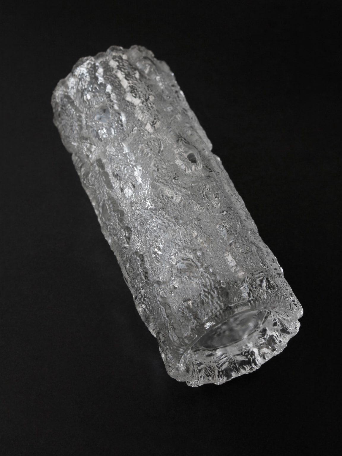Crystal textured glass vase with rough sculptural surface detail