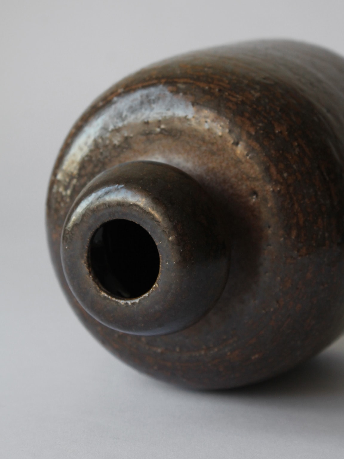 Interior opening view of Rudi Stahl ceramic vase showing glazed finish