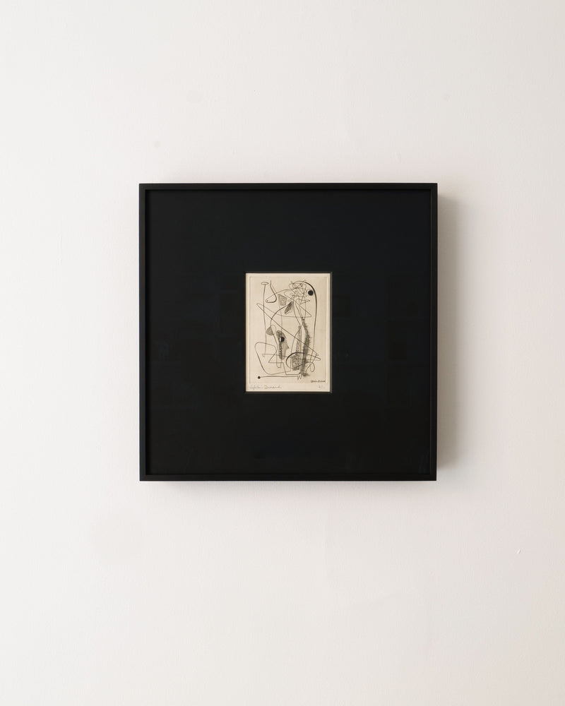 Surrealist Engraving Signed Sylvain Durand by Collection apart, in a black frame, hangs on a white wall. The artwork showcases intersecting curved and straight lines in an intricate minimalist composition.