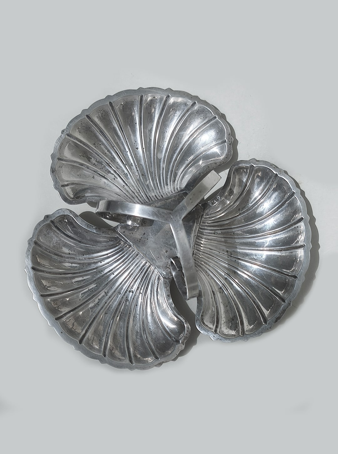 Silver-plated triple shell serving tray with ribbed design detail