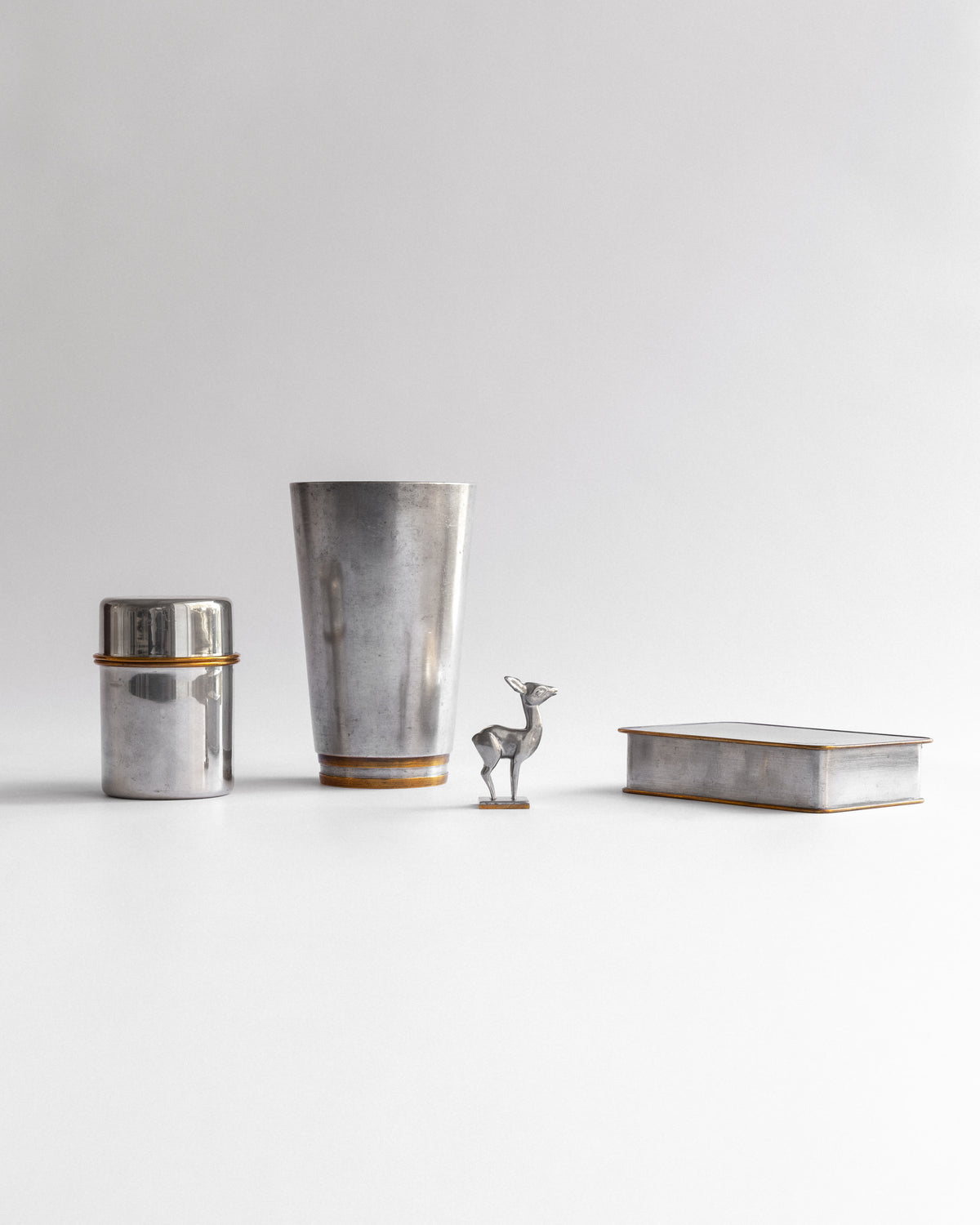 Pewter and Brass Lidded Vessel by Estrid Ericson for Svenskt Tenn, 1955 — lifestyle setting