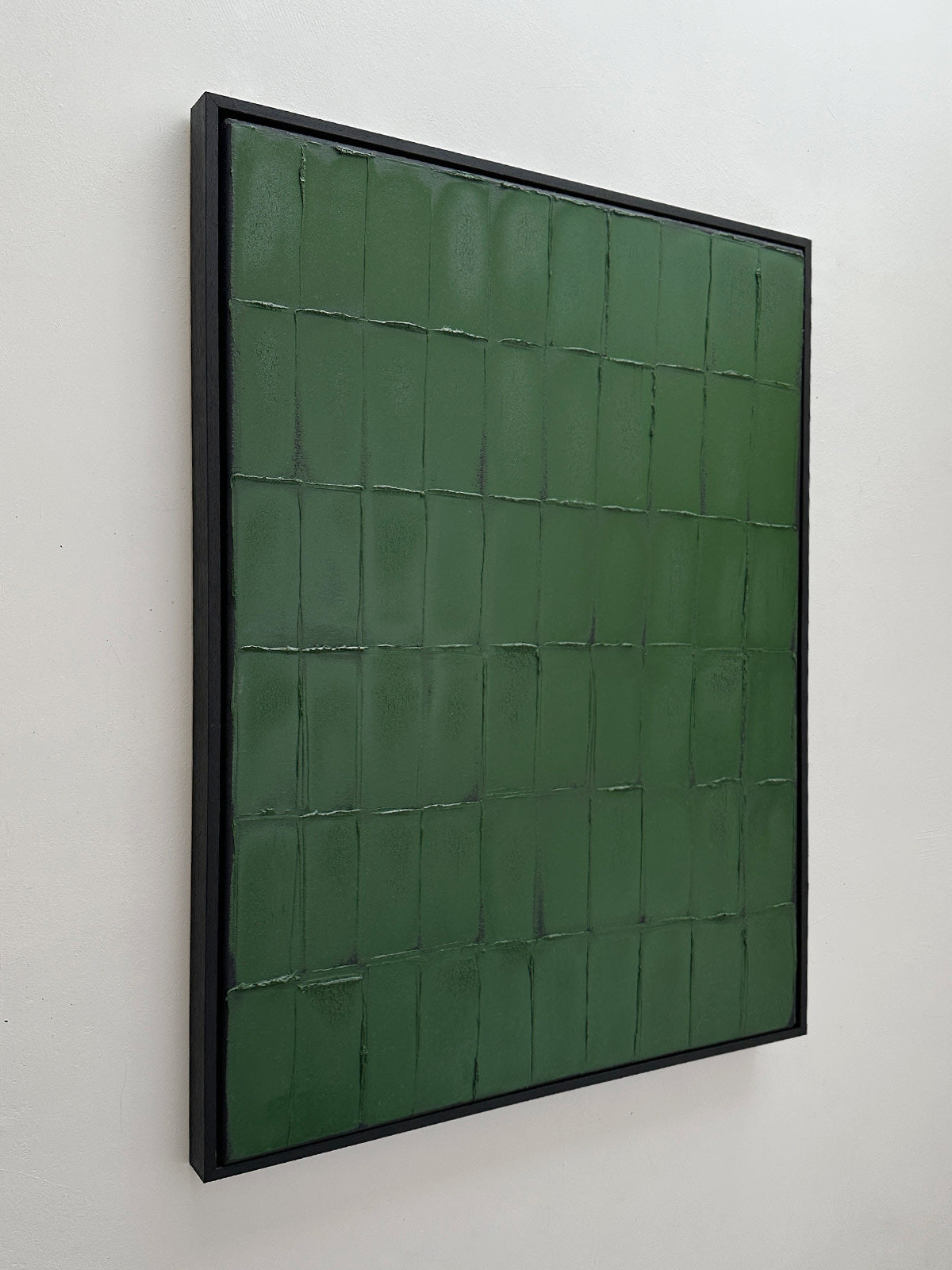 Terre Verte green textured painting with grid pattern by Roi Elmaliah