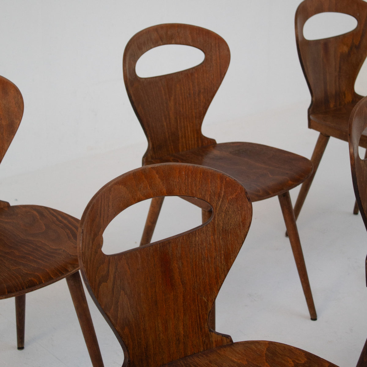 Set of Six Sculptural Wooden Dining Chairs — lifestyle setting