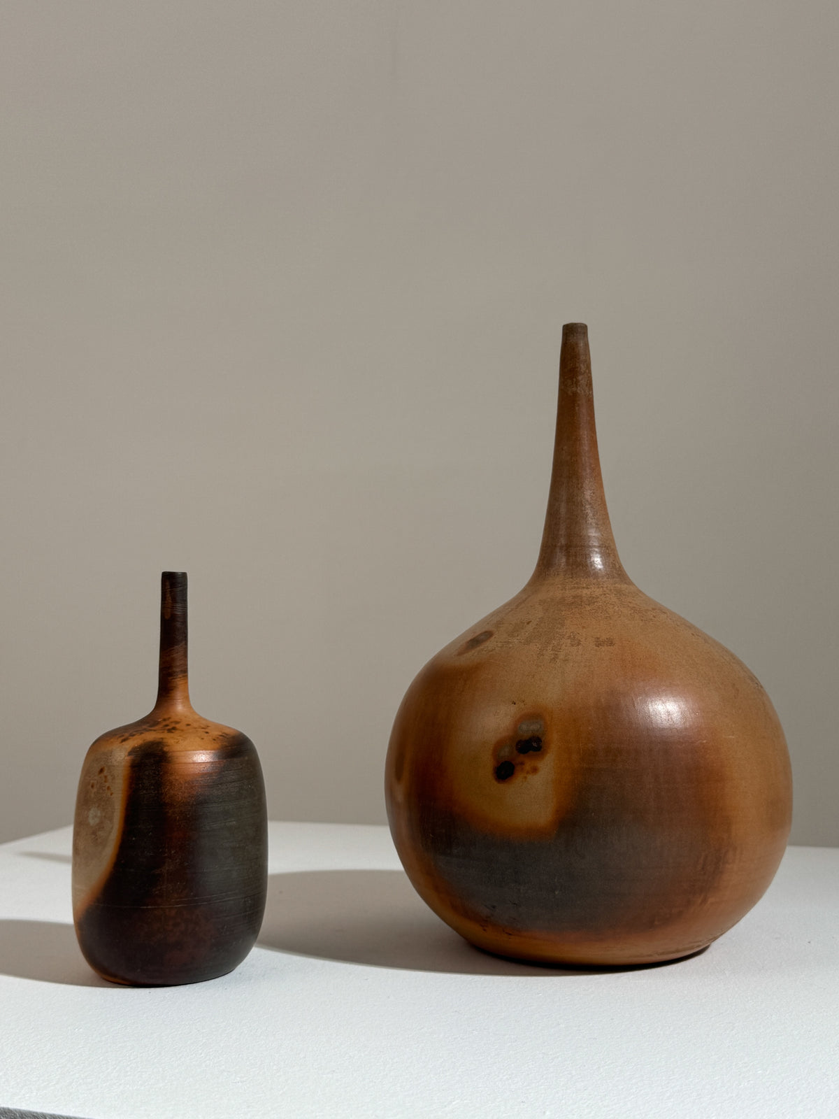 Two ceramic soliflore vases by Pierre Bayle with earth-tone glazes