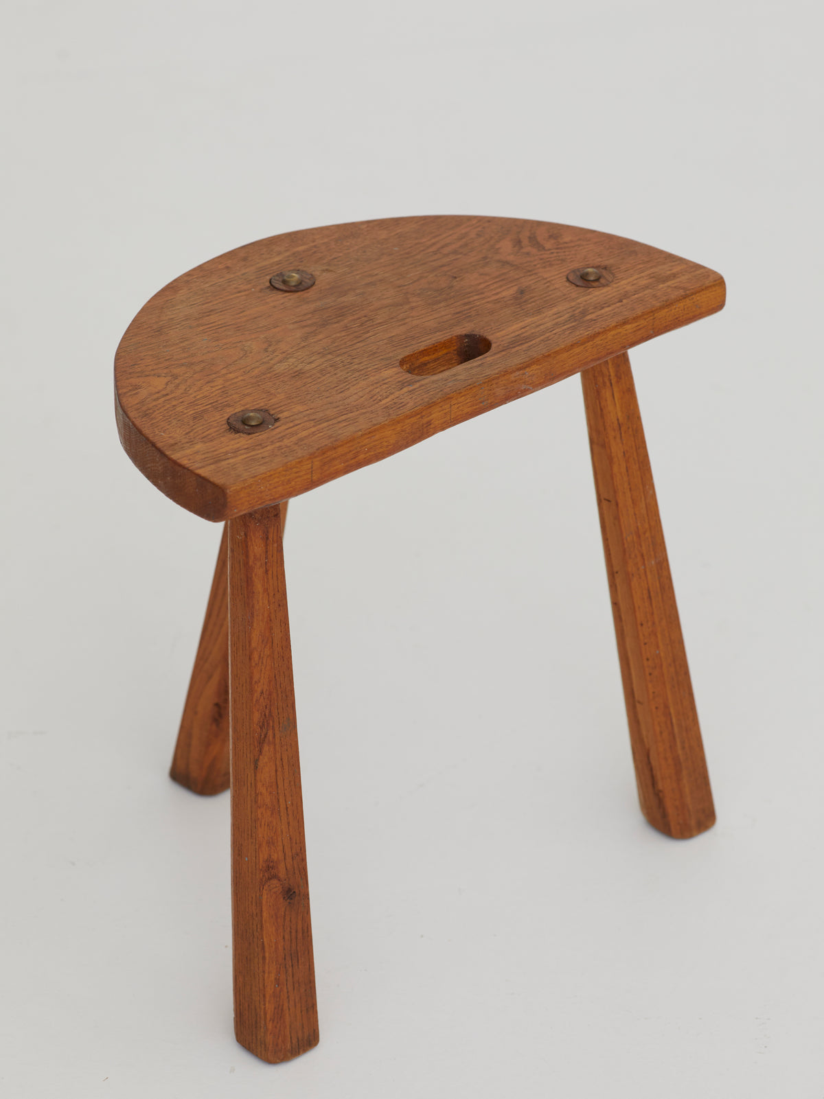 Two French Artisanal Solid Wood Half-moon Tripod Stools, Circa 1950 — back view highlighting wooden legs and seat