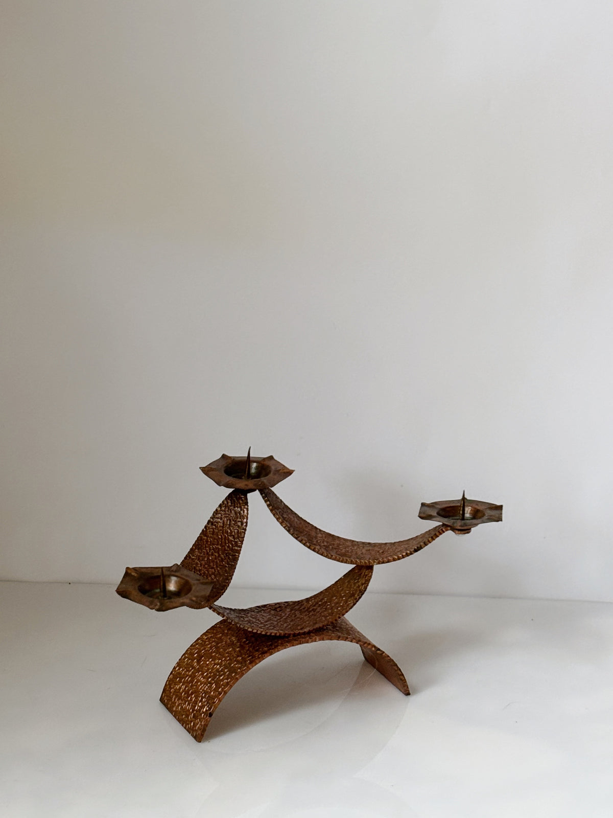 Mid Century Hammered Metal Candlestick, Poland — top view highlighting textured metal design