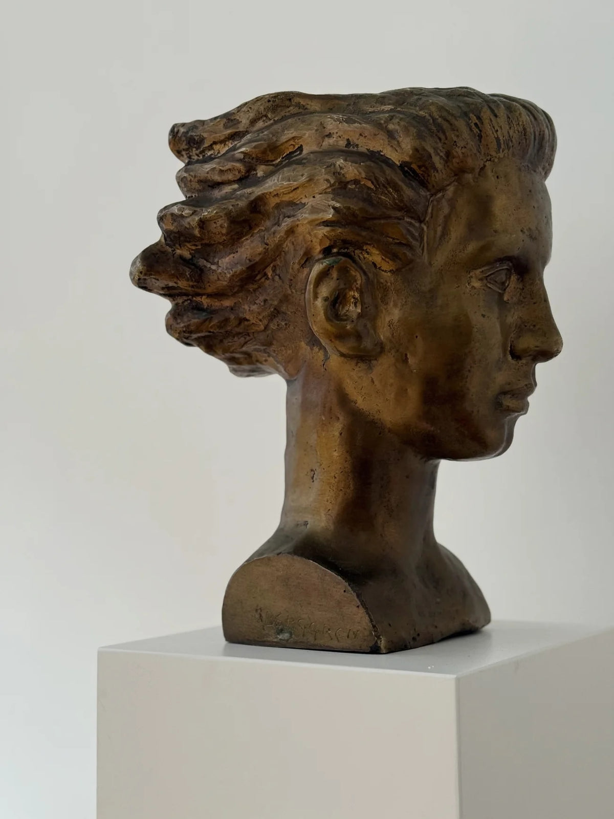 Bronze Sculpture by Sigge Berggren — side view highlighting textured hair details