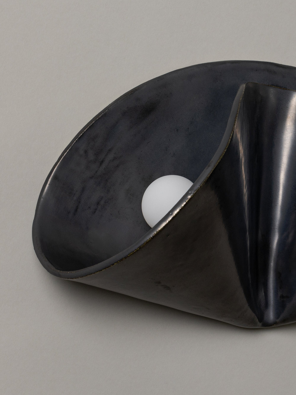 Shado Sconce, Graphite — lifestyle setting