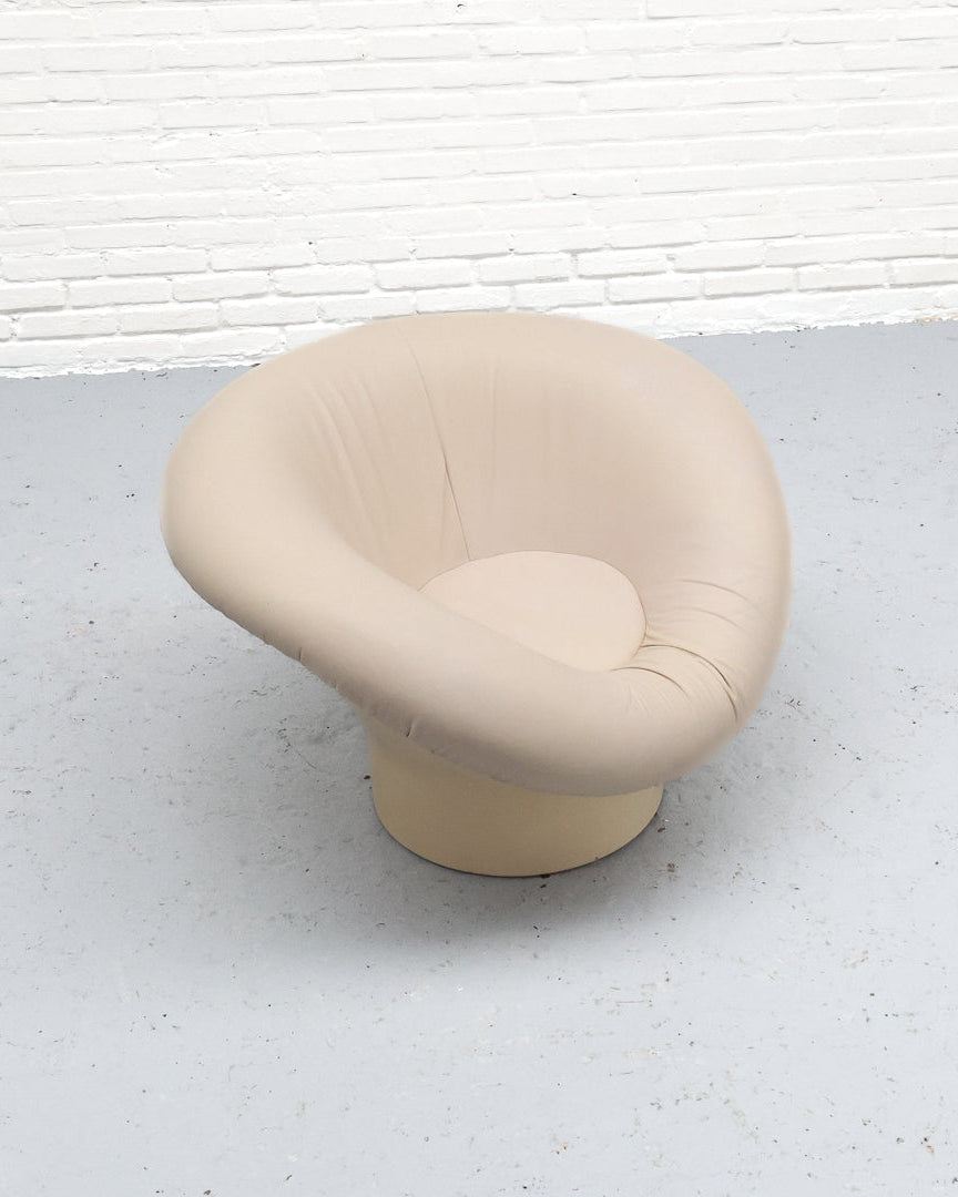 Beige leather Krokus swivel chair by Lennart Bender showing wear