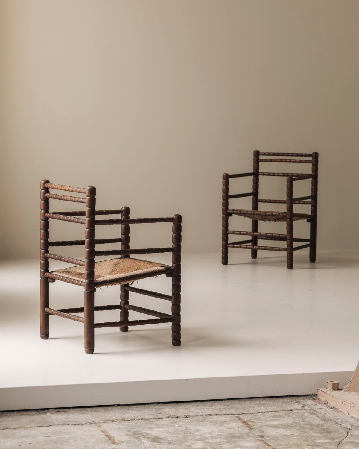 Sculptural French 'Bobbin' armchairs, 1950s — detail view