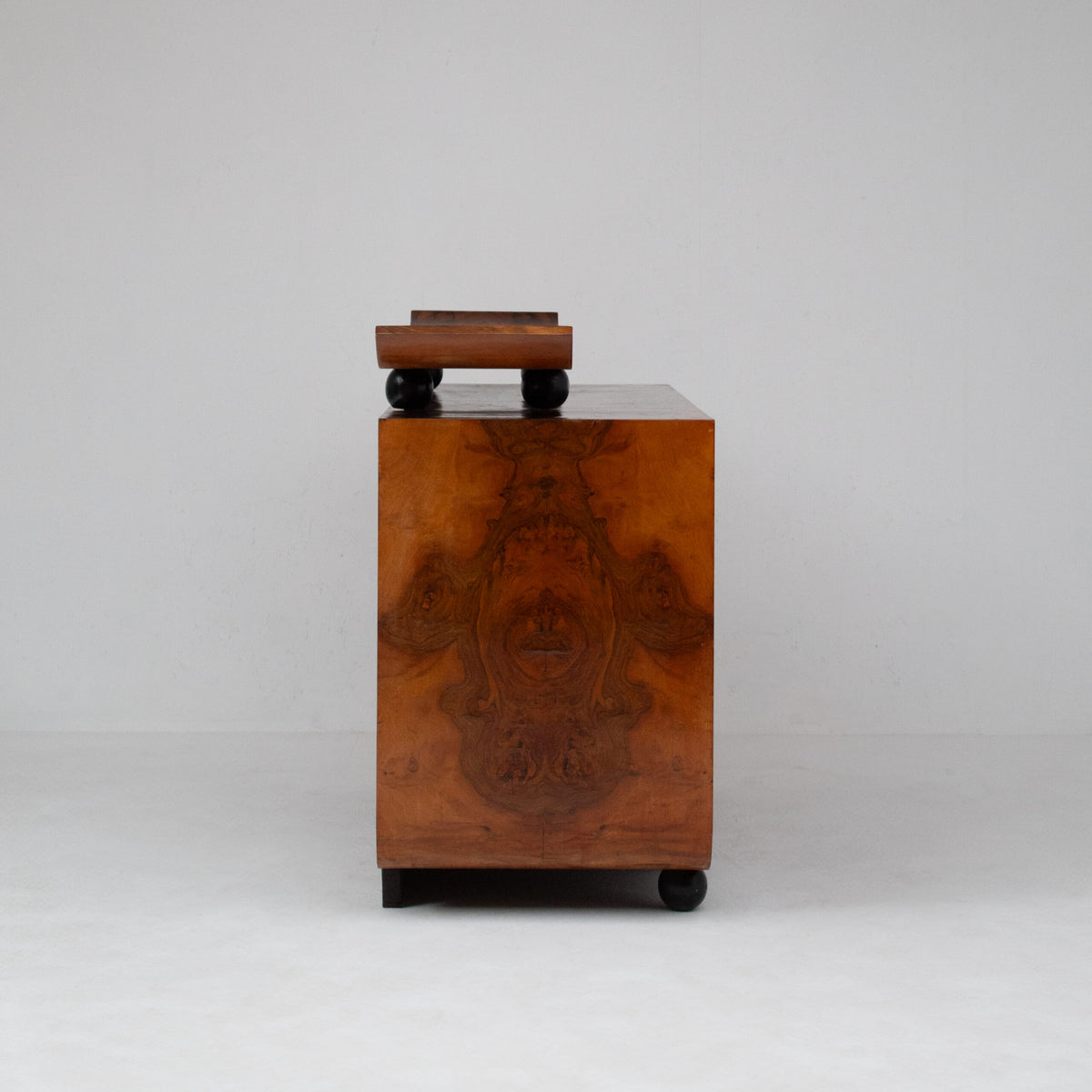 Art Deco Burl Wood Cabinet with Sculptural Top — close-up