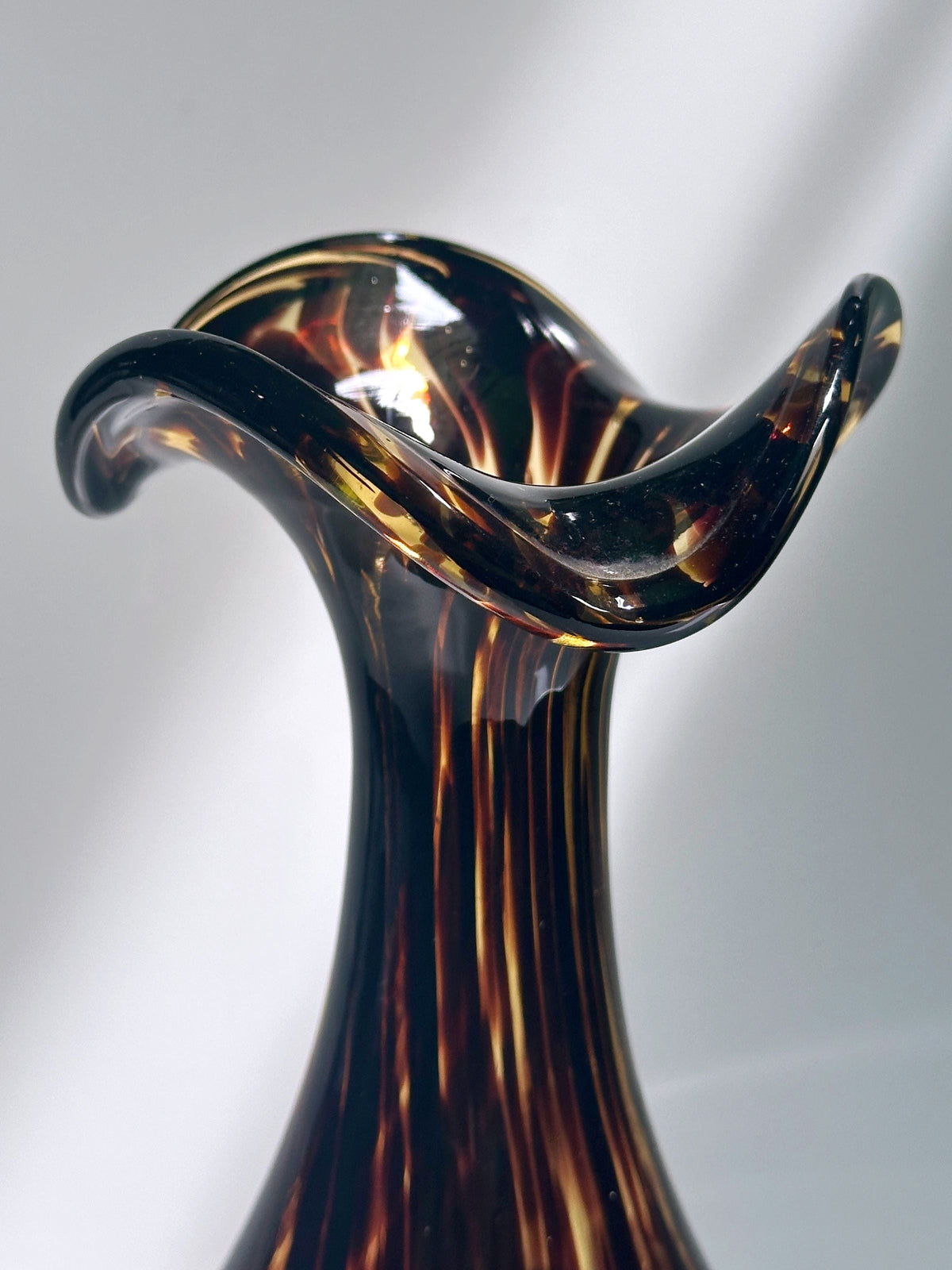 Large Murano tortoise glass vase detail showing wavy rim edge