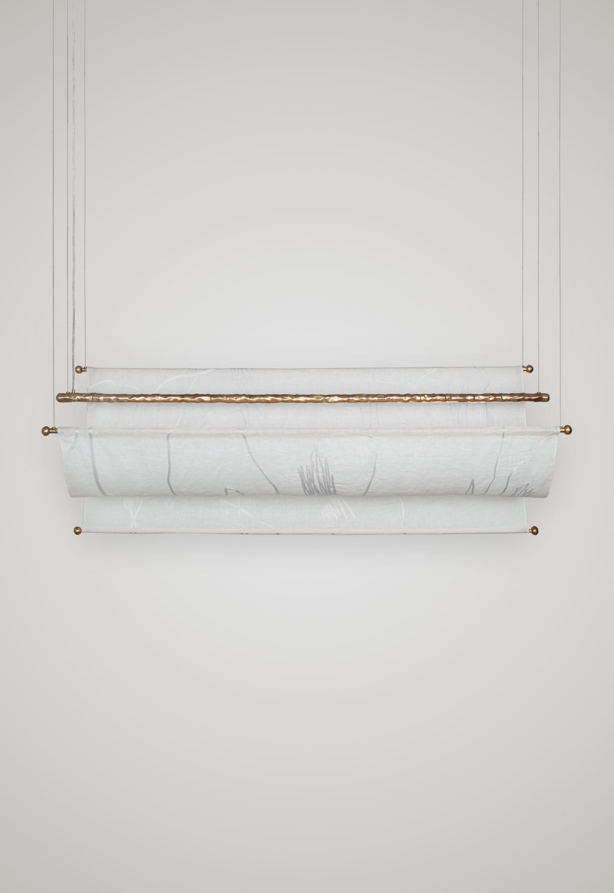 Aria Ceiling — top view of fabric shade with brass accents