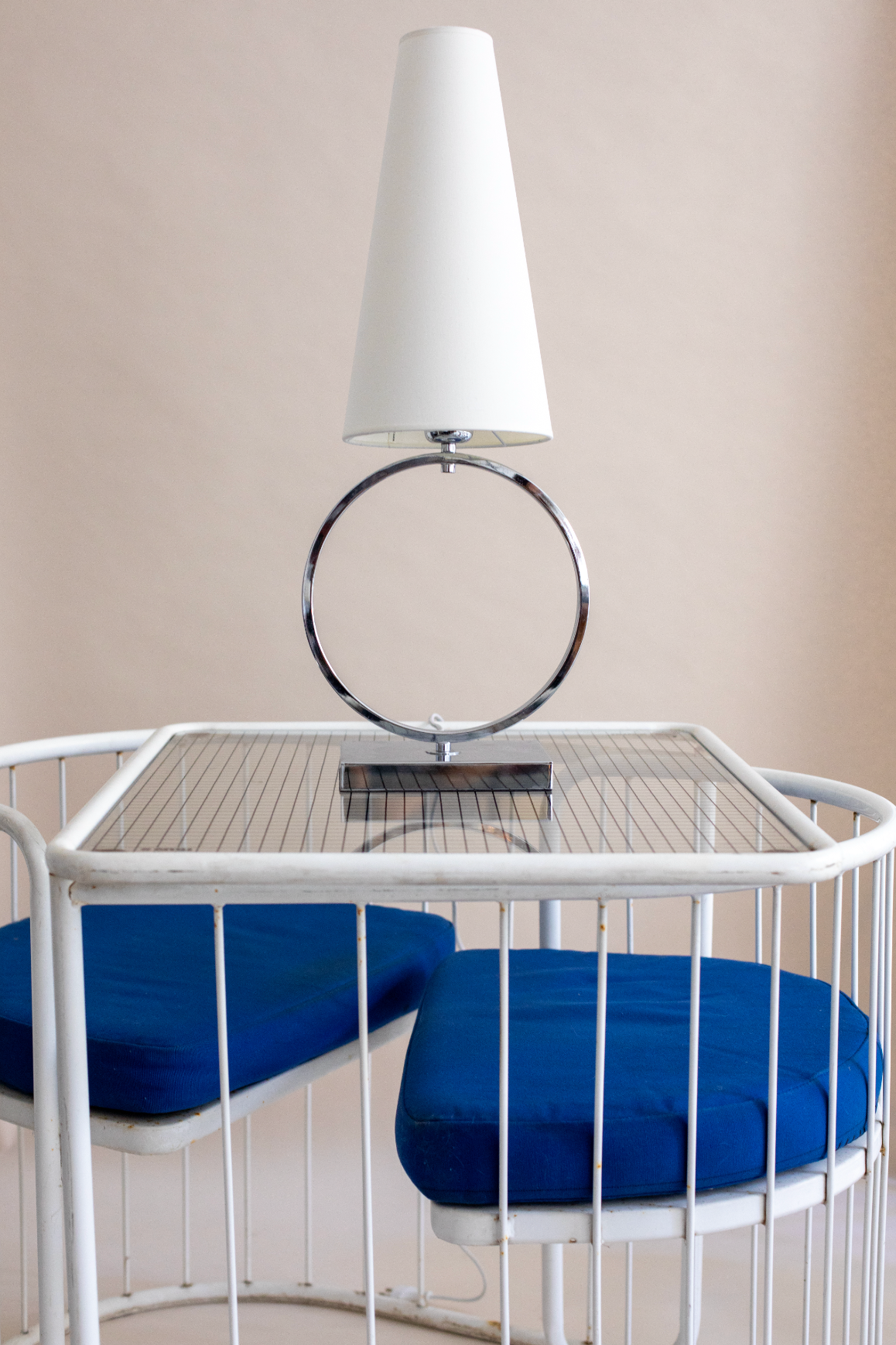 Modern Olhao table lamp with chrome circular base and white shade