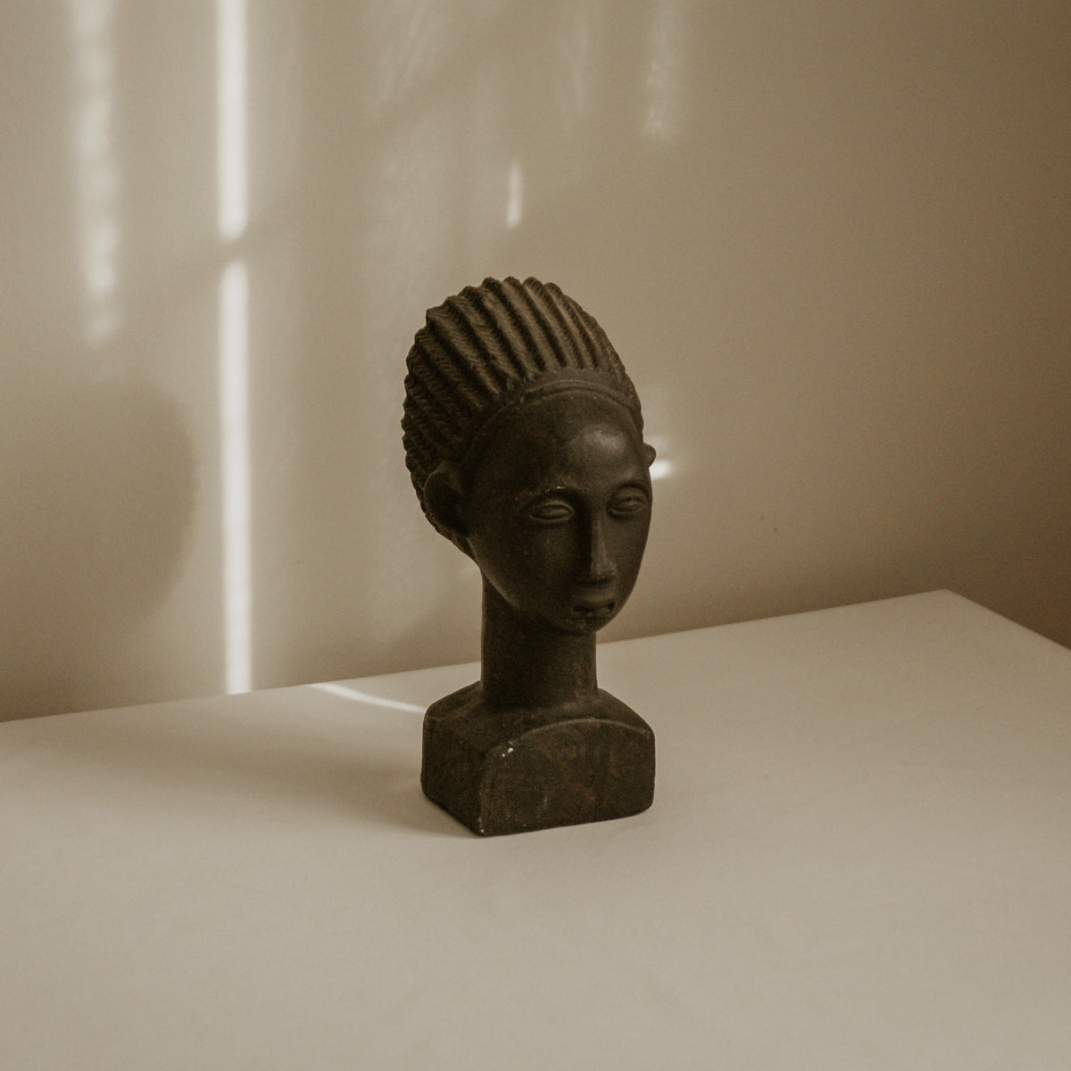 African Terracotta Bust — side angle