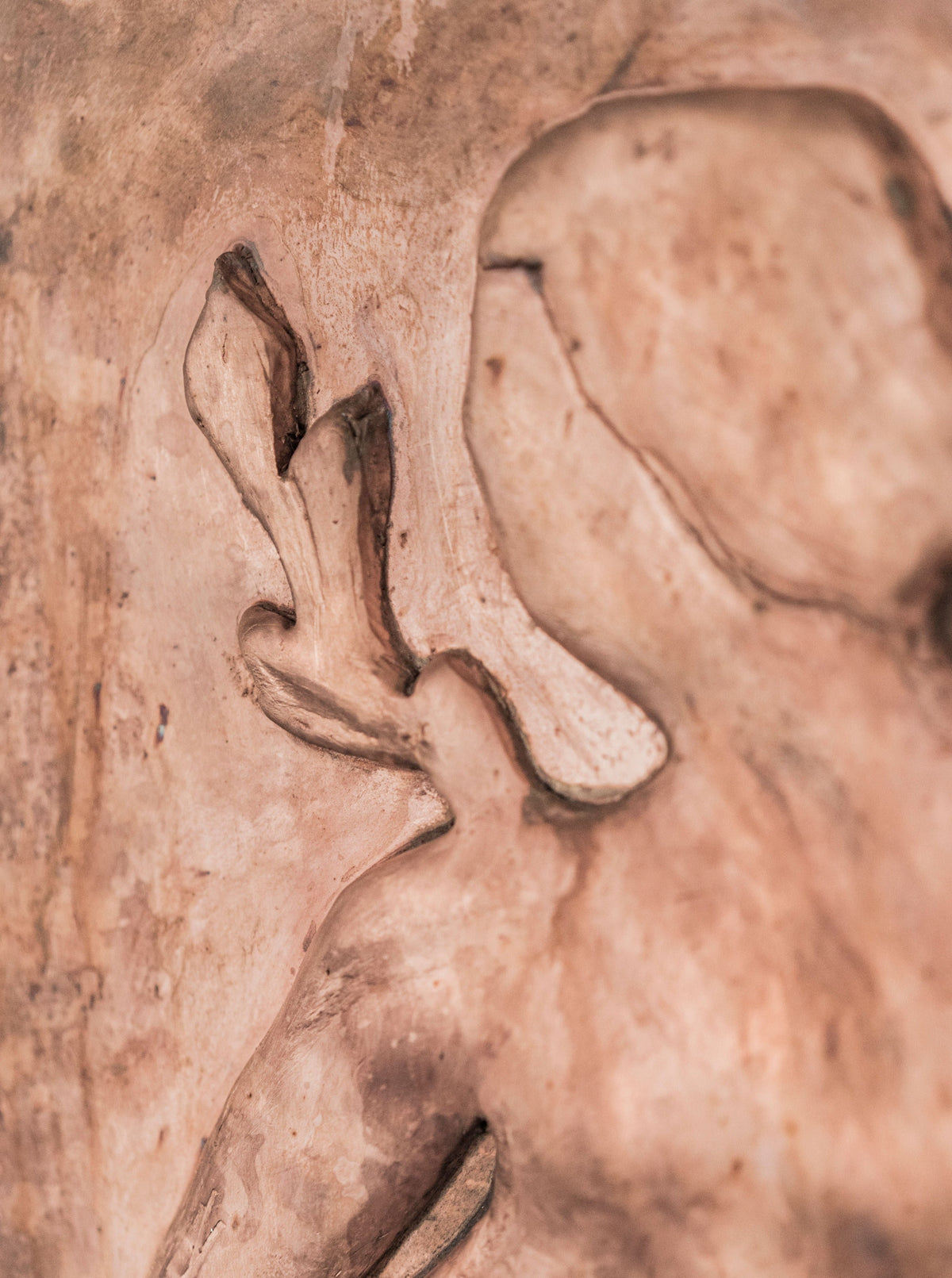 Woman with Laurel Leaves' Chikanka — side angle highlighting textured clay surface